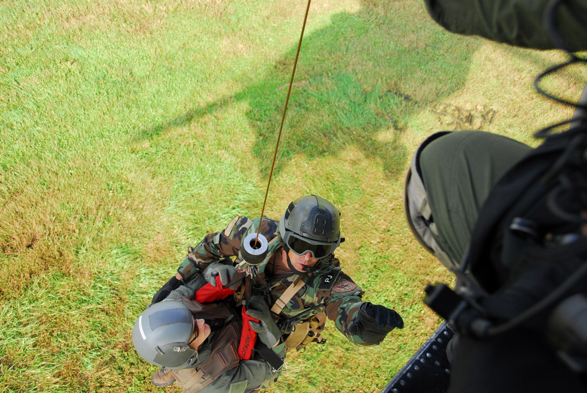 OSAN AIR BASE, Republic of Korea- MSgt Rich Carroll, Pararescueman, hoist up a downed pilot during a Combat Search and Rescue demonstration during Osan's Air Power Day October 7, 2007 (U.S. Air Force photo by Staff Sgt. Ronnie Hill) 