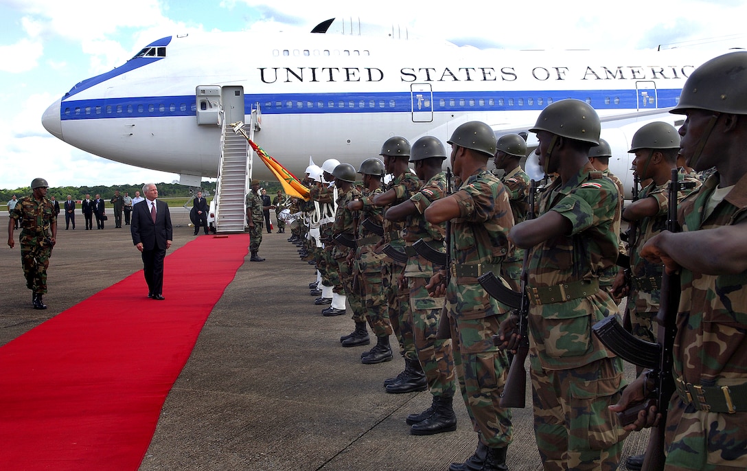 Secretary of Defense Robert M. Gates walks past the Surinamian Army Band and Color Guard that turned out to honor him in Paramaribo, Suriname, shortly before a scheduled press conference.
