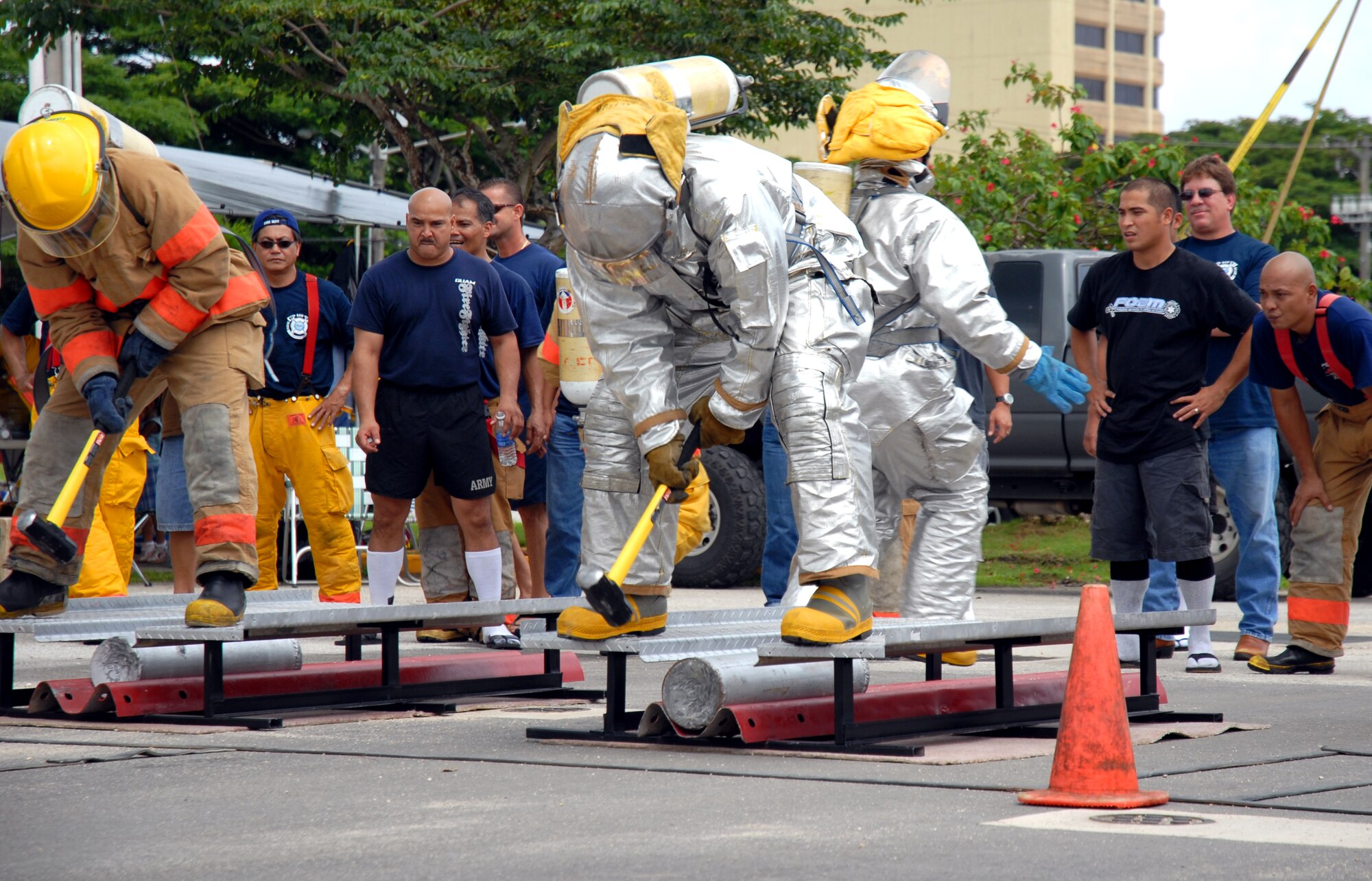 ANDERSEN AFB, GUAM---Firefighter, Eric Masur , 36th Civil Engineering Squadron, participates in the team relay portion of the 2nd Annual Island-Wide Firefighter Muster that was held at the Agana Shopping Center, October 6, 2007, in conjuction with Fire Prevention Week.  Mr. Masur  placed first in the solo relay event.  Andersen's Firefighters placed second overall for both days that the event was held.
(U.S. Air Force photo by Senior Airman Miranda Moorer)(RELEASED)                                     