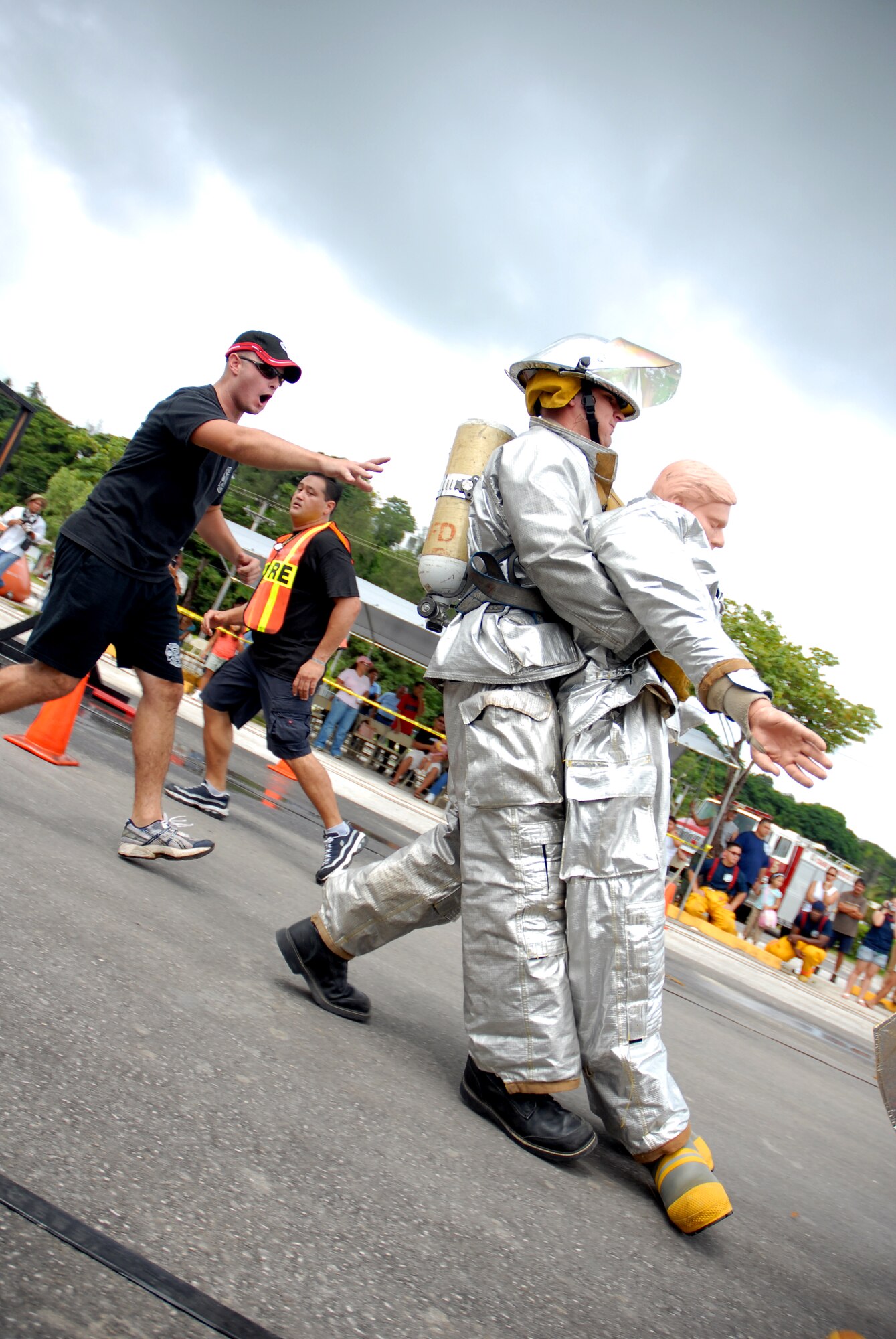 ANDERSEN AFB, GUAM---Firefighter, Staff Sergeant Brent Watkins, 36th Civil Engineering Squadron , participates in the team relay portion of the 2nd Annual Island-Wide Firefighter Muster that was held at the Agana Shopping Center, October 6, 2007, in conjuction with Fire Prevention Week.  Andersen's Firefighters placed second overall for both days that the event was held.
(U.S. Air Force photo by Senior Airman Miranda Moorer)(RELEASED)                                     