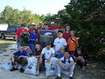 Local Boy Scout Troop 475 gathered at the Randolph Recreation Park at Canyon Lake Sept. 29 to support the Environmental Flight’s Wildflower Seeding Legacy Project, funded by the National Public Lands Day organization, which grants funding to support environmental initiatives. This is the third year the flight has been awarded funding to plant native wildflower seeds with the intent of the flowers reseeding and repopulating naturally in the future. The boy scout troop earned service hours while learning the importance of native wildflowers to the ecosystem. (U.S. Air Force photo by Matt Kramm)