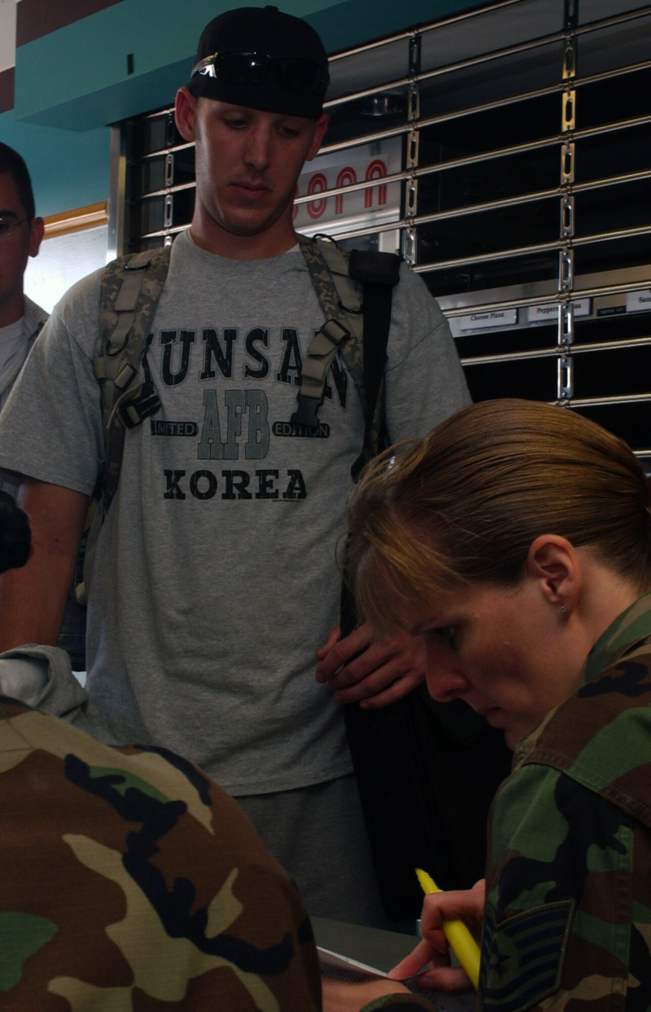 KUNSAN AIR BASE, South Korea-- Senior Airman Cody Baker, from the 555th Expeditionary Fighter Squadron, ensures his paperwork is in order in preparation for his redeployment back to Aviano Air Base, Italy. The 555th EFS were here for a four- month deployment . The deployment is part of a continued commitment the U.S. has to South Korea to ensure stability and security in the region. The deployment was also the first for a United States Air Forces in Europe unit to deploy to a Pacific Air Forces base. (U.S. Air Force photo/Senior Airman Steven R. Doty)                         