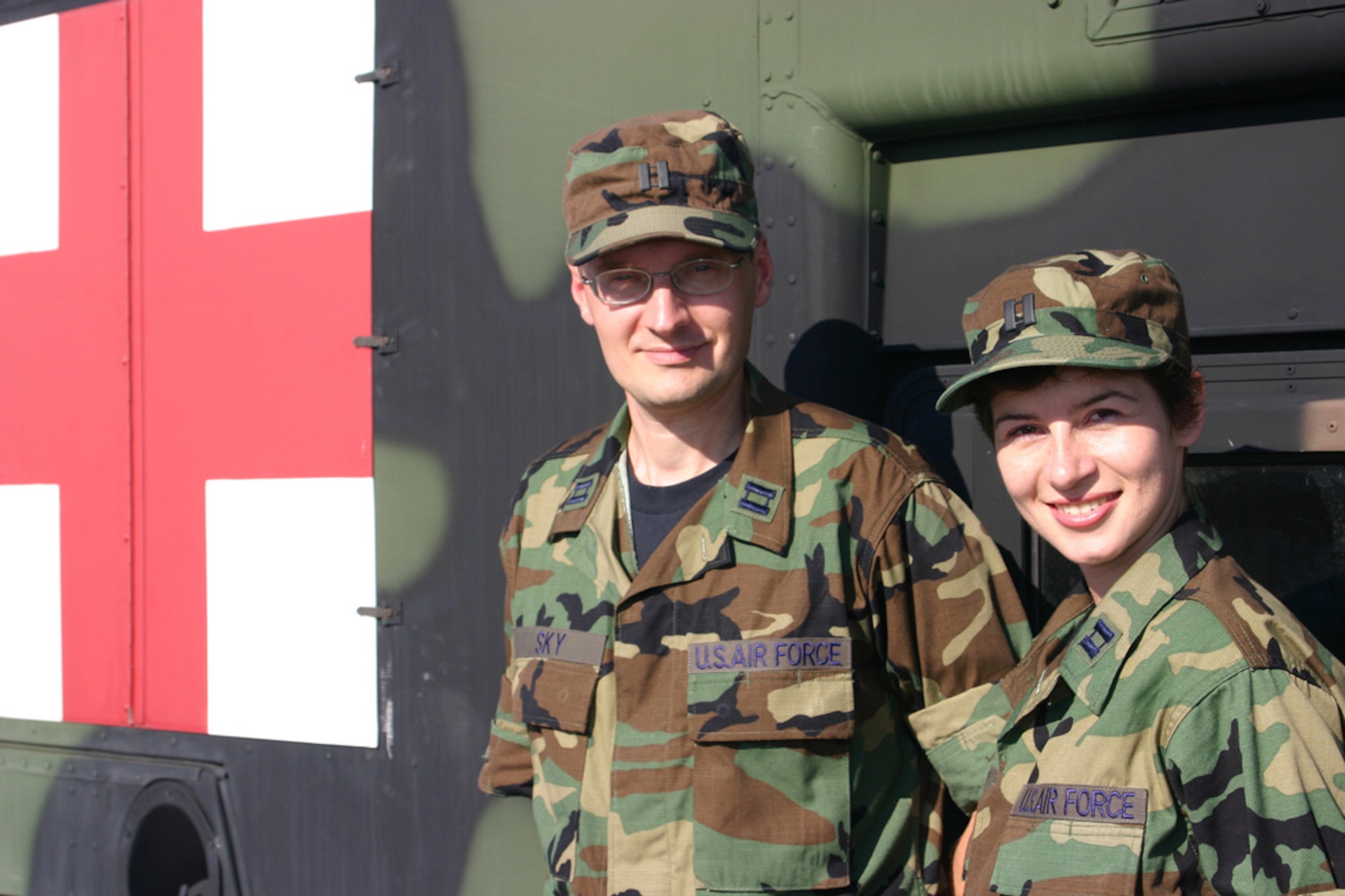 Capts. Nikolay and Zoya Sky, who immigrated to America eight years ago from Russia, graduated from Officer Training School recently and serve as Air Force dentists at McGuire Air Force Base, N.J.  The couple, who immigrated to America with just $500 and some of their belongings, graduated Officer Training School and will practice dentistry in the U.S. Air Force after eight years of hard work and dedication. (U.S. Air Force photo/Jason Lake)