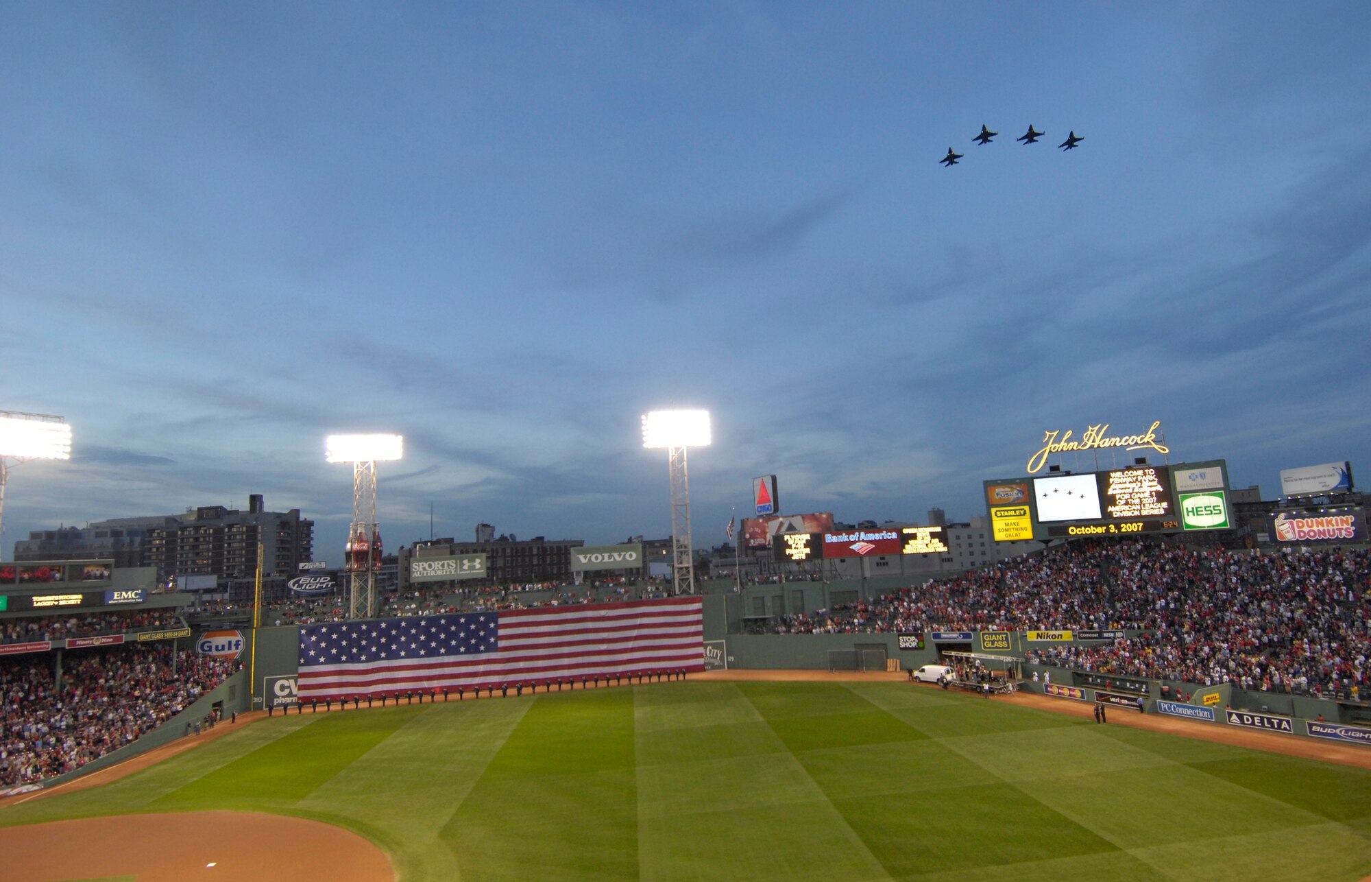 A formation of F16’s, flown by the Green Mountain Boy’s from Vermont, flyover Fenway Park Oct. 3 during the first game of the American League Division Series between the Red Sox and the Los Angeles Angels. The Red Sox won the game 4-0. (U.S. Air Force photo by Walter Santos.)

