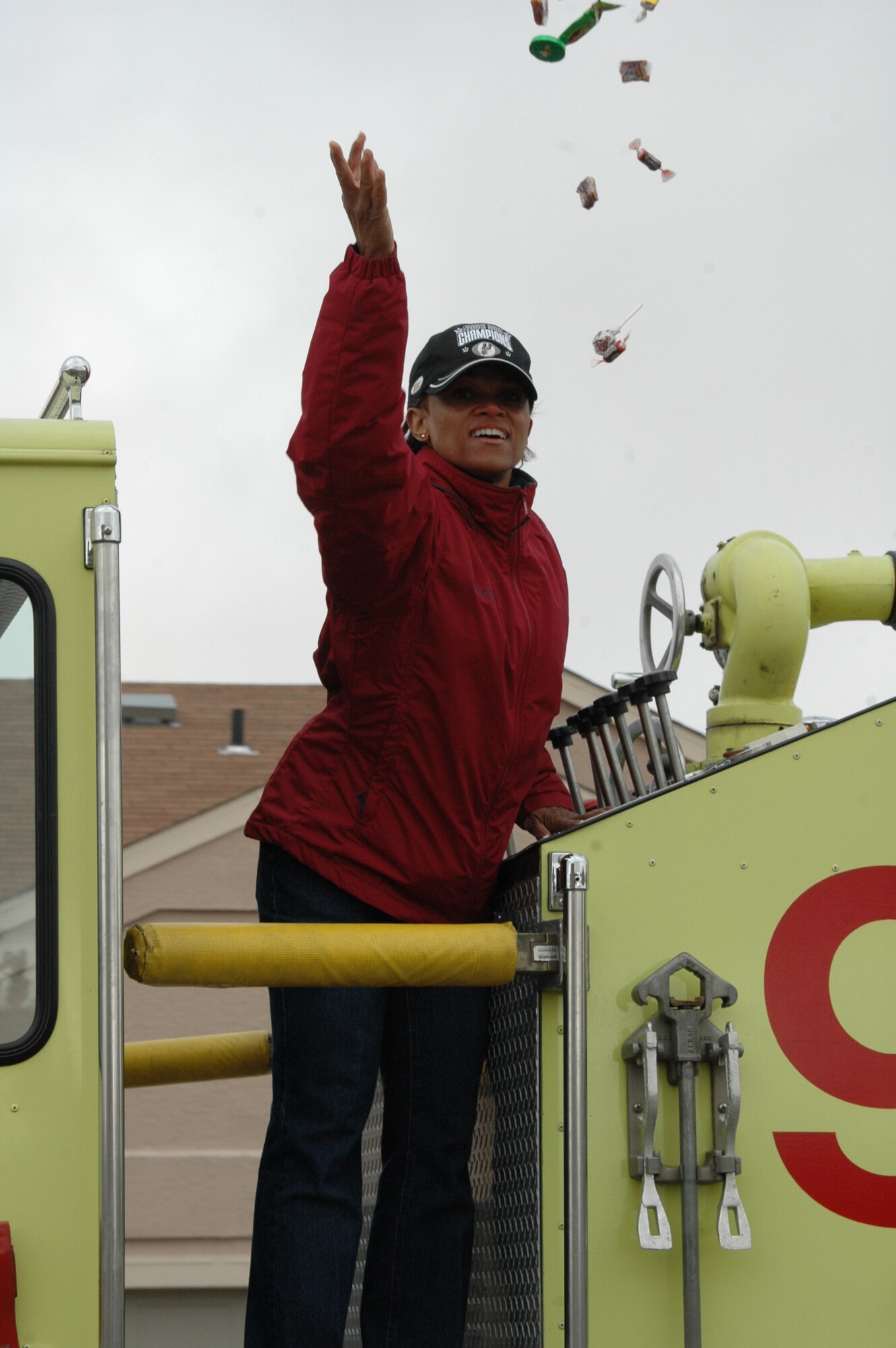 Col. Renita Alexander, 28th Mission Support Group commander throws candy to the crowd who came out for the Fire Prevention Week Parade. The parade was followed by an open house at the Fire Department. This year's theme is Practice your Escape Plan.
(U.S. Air Force photo/Airman 1st Class Kimberly Moore Limrick)