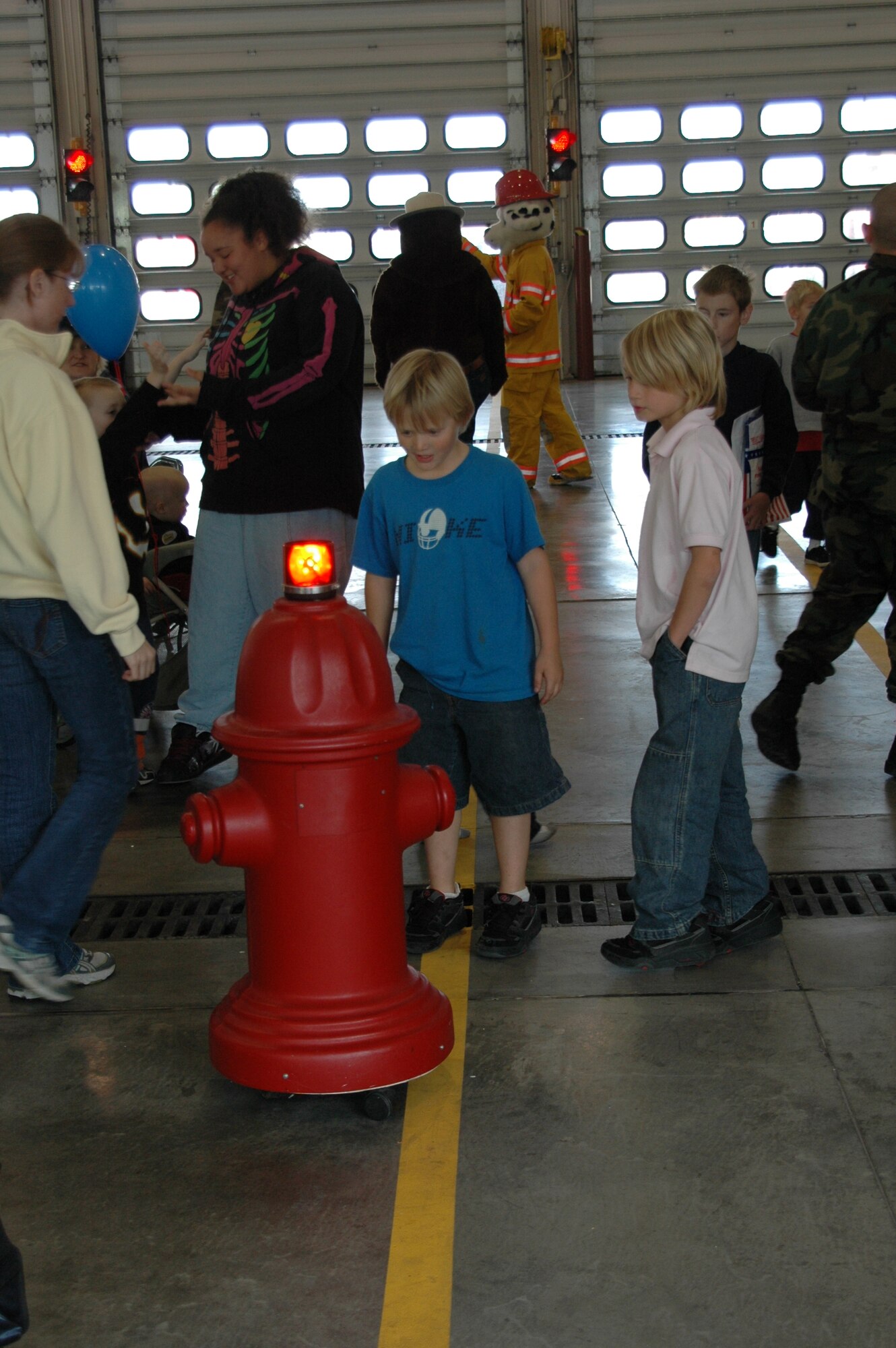 A remote controlled fire hydrant grabs the attention of many during an open house at the fire department Oct. 6. The open house was preceeded by a Fire Prevention Week Parade. This year's theme is Practice your Escape Plan.
(U.S. Air Force photo/Airman 1st Class Kimberly Moore Limrick)