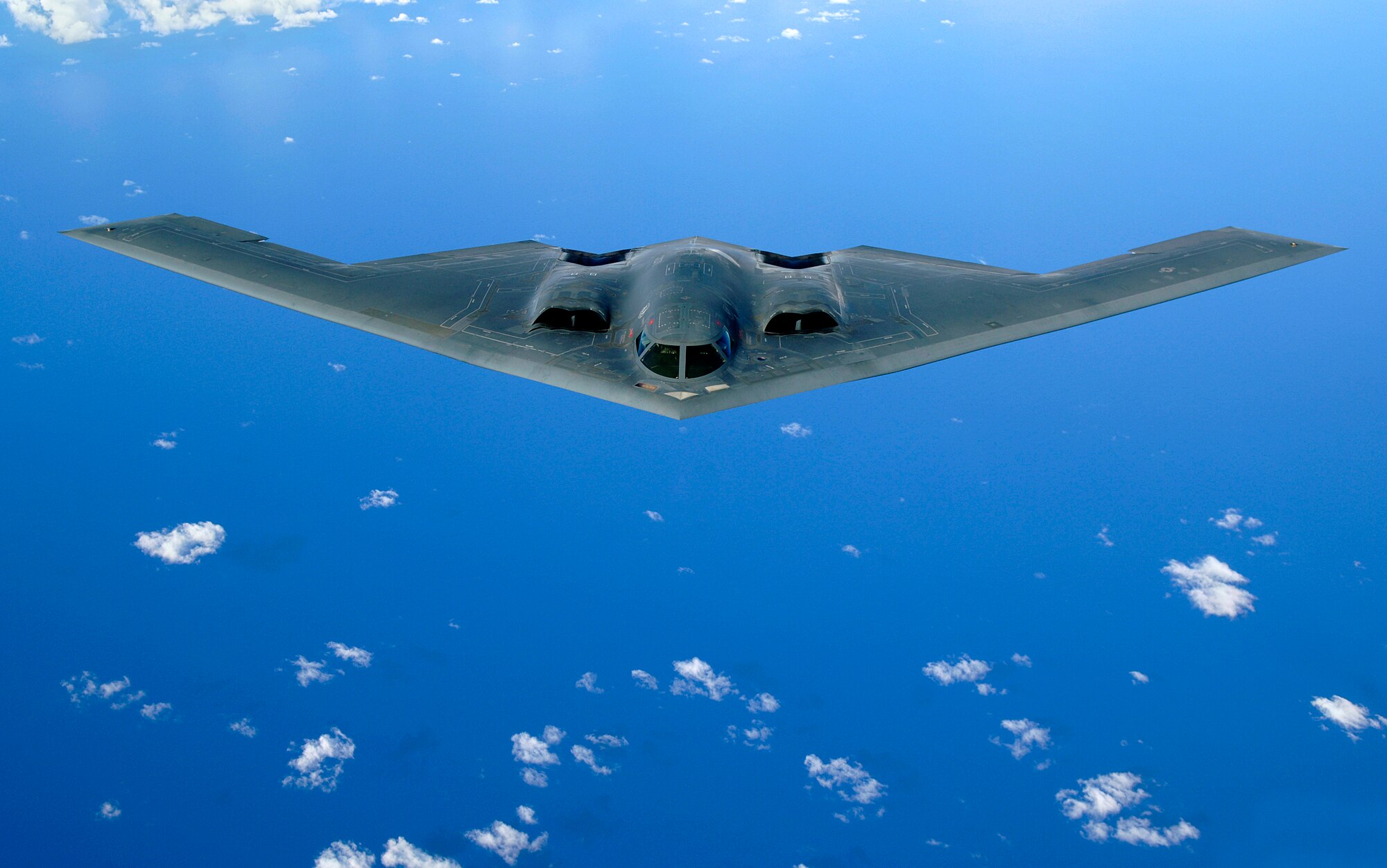 Four B-2 Spirits, like this one flying over the Pacific Ocean, arrived at Andersen Air Force Base, Guam,  Oct. 7 as part of a continuous bomber presence in the Asia-Pacific region. (U.S. Air Force photo/Staff Sgt. Bennie J. Davis III) 