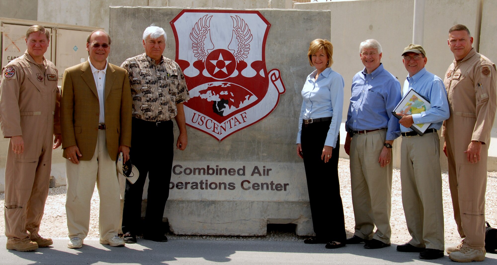 Maj. Gen. Maurice H. Forsyth and congressional delegates Steven Cohen,  F. Allen Boyd Jr., Betty Sutton, Roger Wicker and Wayne Gilchrest stand with Lt. Gen. Gary L. North at the entrance to the Combined Air and Space Operations Center Oct. 7 in Southwest Asia. General Forsyth is the deputy commander U.S. Central Command Air Forces and General North is the U.S. Central Command Air Forces commander. (U.S. Air Force photo/Tech Sgt. Keith Houin)