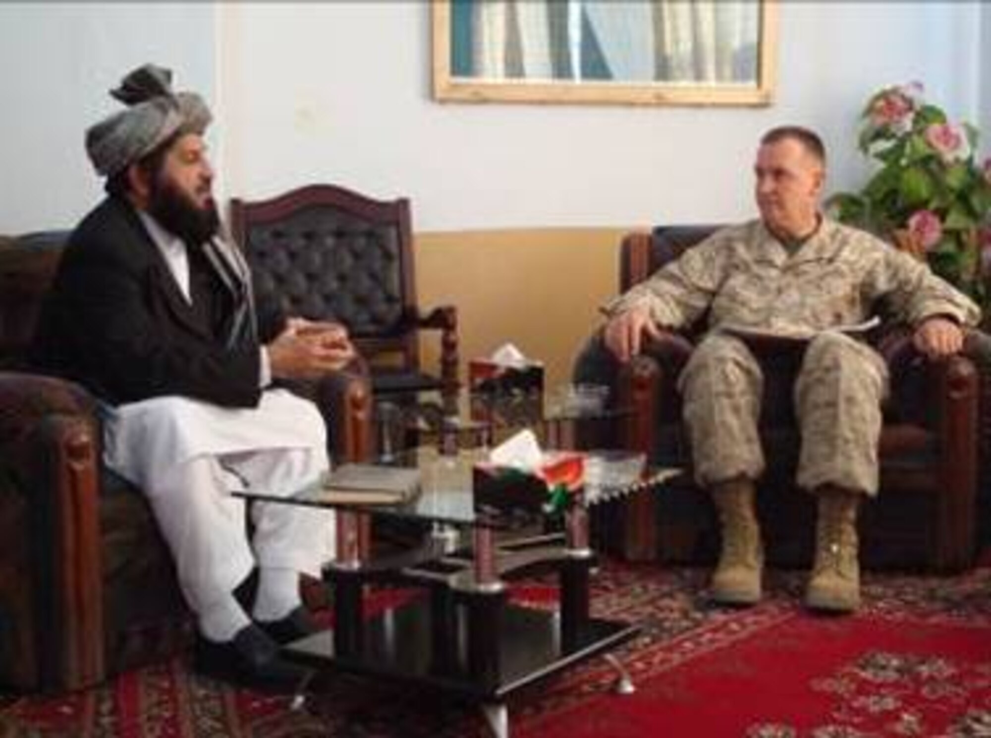 Zabul Province Governor Delbar Jan Arman meets with Joint Chiefs Strategic Plans and Policy Director Lt. Gen. John Sattler on Oct. 9—the sixth anniversary of the U.S.-led invasion against the Taliban—about the future of this southern province of Afghanistan.  (Air Force photo by Capt. Bob Everdeen)