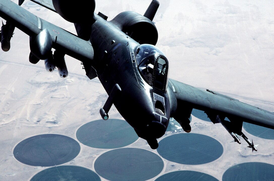 An A-10A Thunderbolt II aircraft flies over a target area during Operation Desert Storm. It was designed specially for the close-air-support mission and has the ability to combine large military loads, long loiter and wide combat radius, which proved to be vital assets to the United States and its allies during Operation Desert Storm and Operation Noble Anvil.