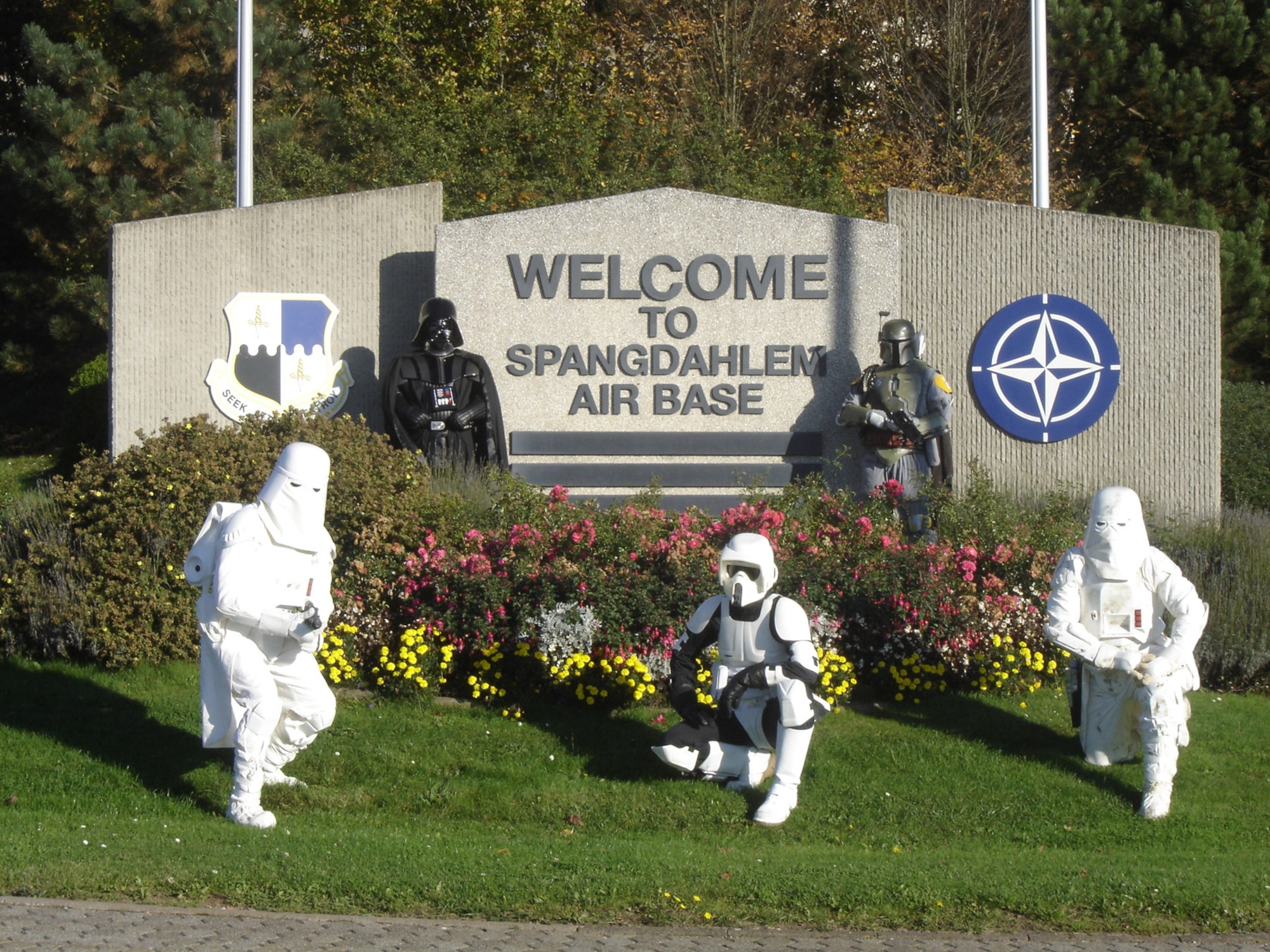 SPANGDAHLEM AIR BASE, Germany – Five German members of the 501st Imperial Legion, a Star Wars charity organization, pose in front of the Spangdahlem Air Base sign before making an appearance at the base Star Wars convention celebrating the 30th anniversary of the first movie release Oct. 6. (U.S. Air Force photo/Andrew Rice)  