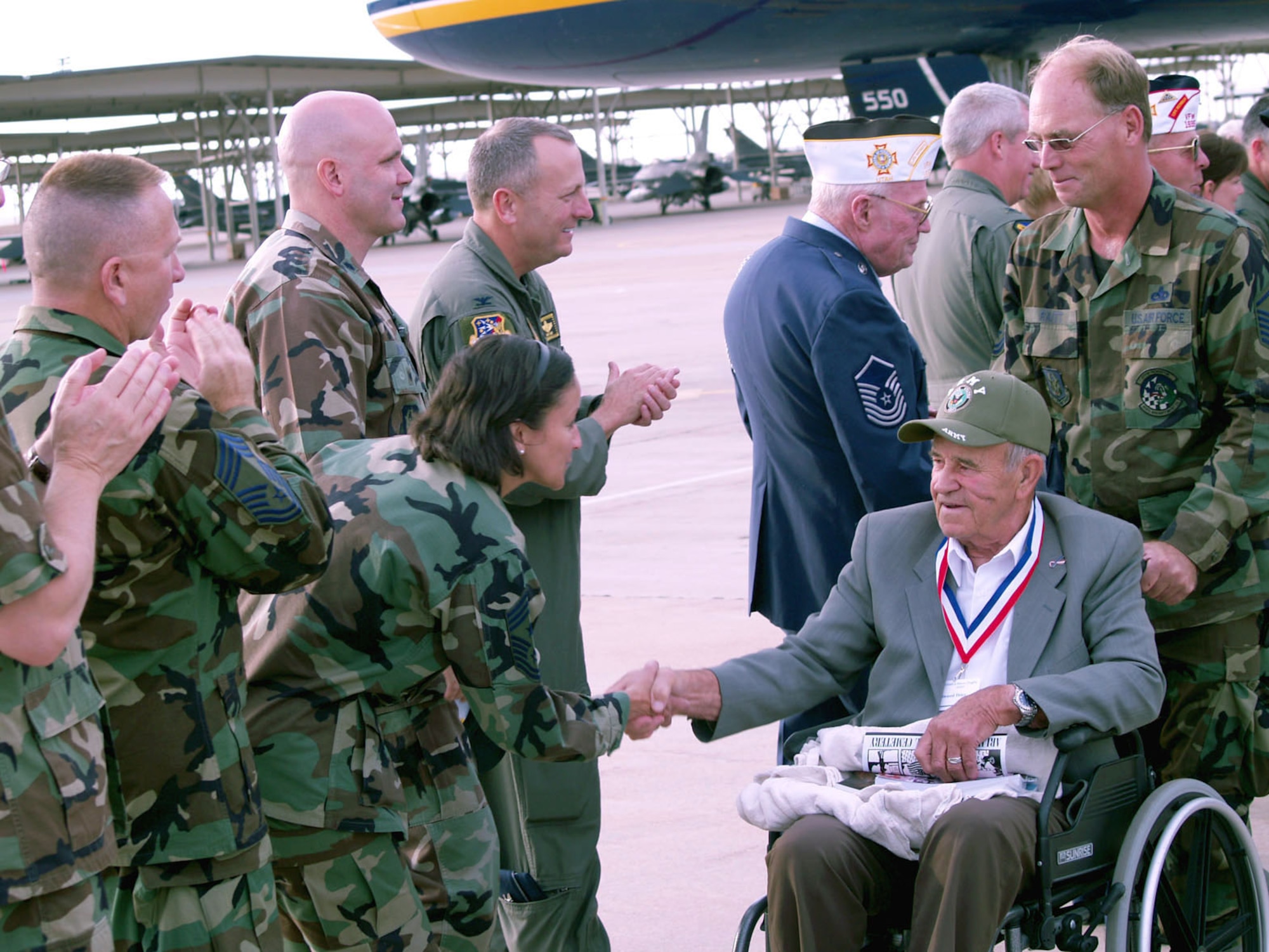 Chief Master Sgt. Elizabeth Atisme, 419th Fighter Wing Command Chief, and other wing personnel, greeted the WWII veterans upon their return to Hill Air Force Base. (U.S. Air Force photo/Staff Sgt. Nathan Greer)