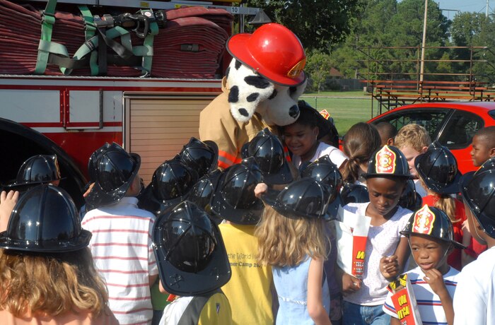Children from the Charleston AFB Youth Programs Center get a chance to meet Sparky as part of a Fire Prevention Week display on Charleston AFB Tuesday. (U.S. Air Force photo/Airman Melissa White)