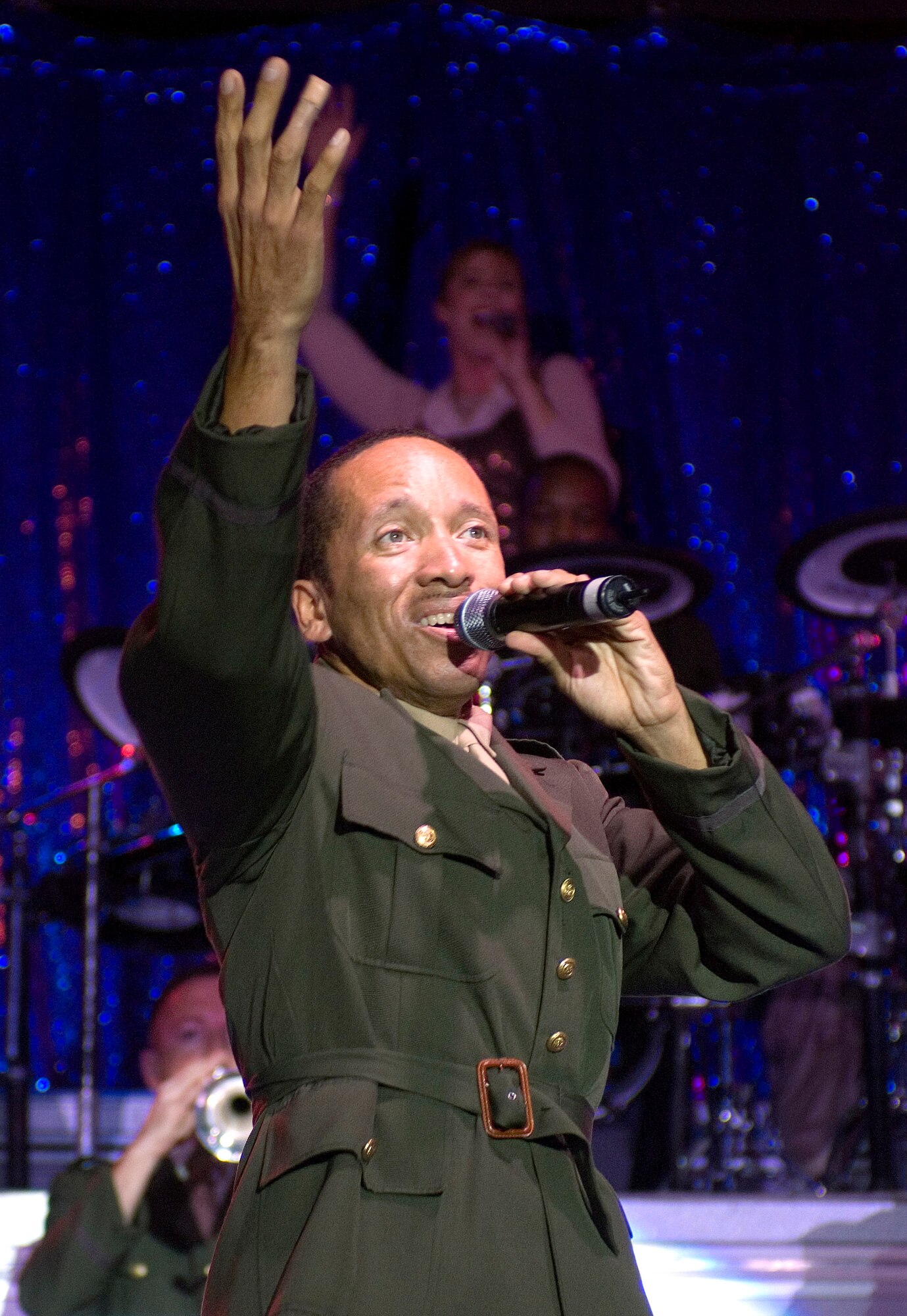 Tech. Sgt. Keith Martin Sr. performs during the Tops in Blue "The Fly-By" musical tribute honoring 60 years of Air Force history Oct. 9 in Mableton, Ga. Tops In Blue was in Georgia as part of Air Force Week Atlanta. (U.S. Air Force photo/Staff Sgt. Bennie J. Davis III)