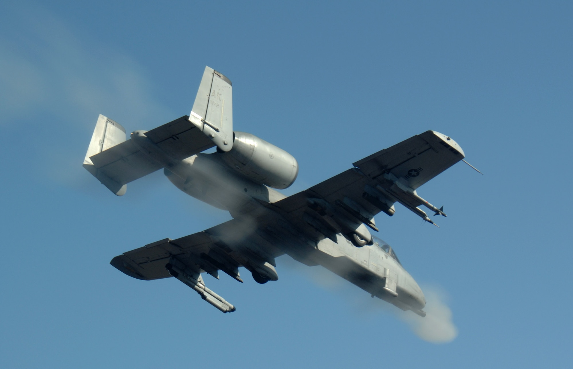 A-10 Thunderbolt IIs, like one shown here firing a GAU-8 30mm cannon at 3,900 rounds per minute, provide close-air-support for coalition troops supporting Operation Enduring Freedom.  (U.S. Air Force photo/Master Sgt. Robert Wieland)