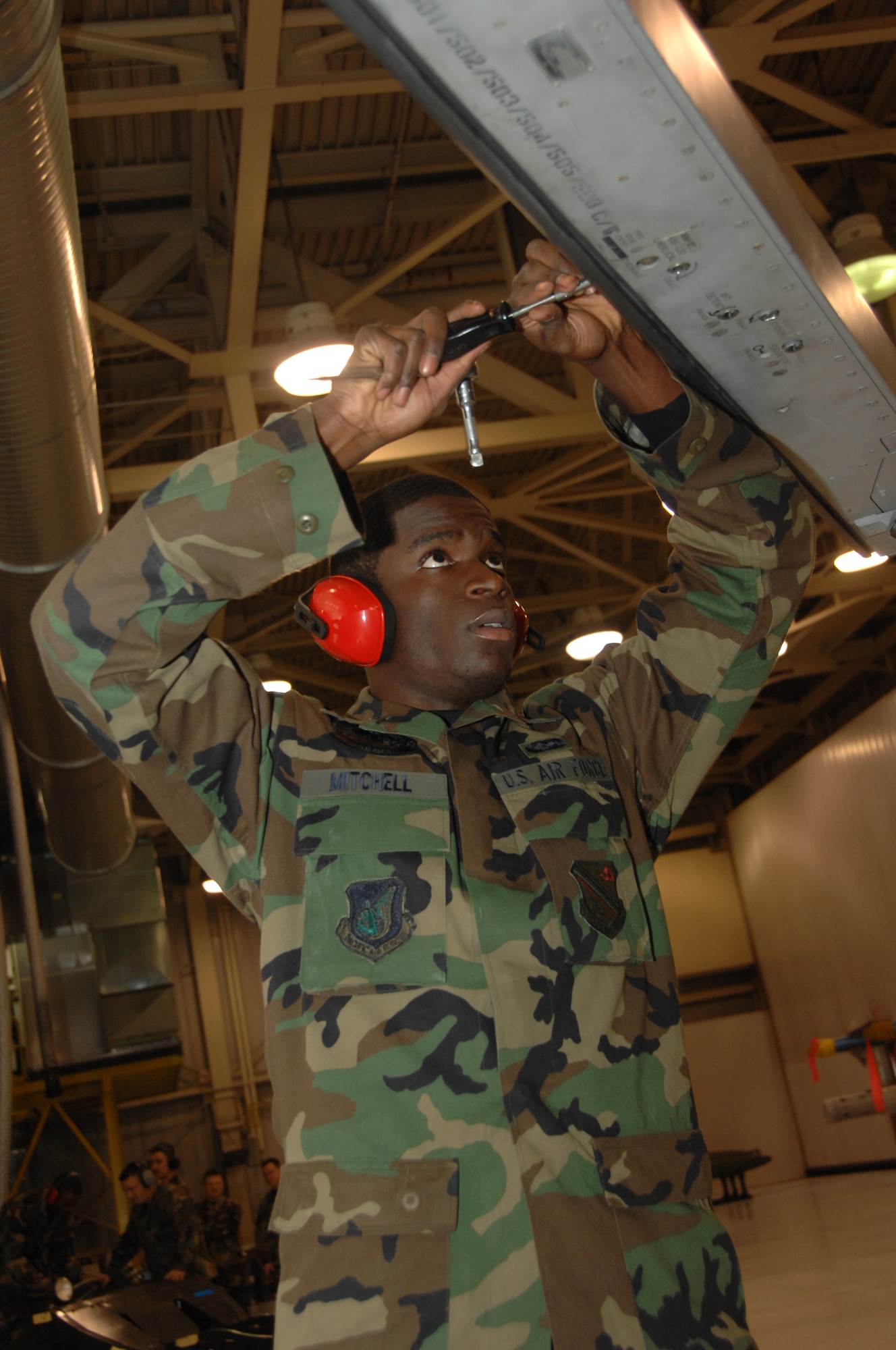 EIELSON AIR FORCE BASE, Alaska - Airman 1st Class Mitch Mitchell, 354th Aircraft Maintenance Squadron, preps an F-16 during the Weapons Standardization Load Crew of the Quarter competition on Oct. 5, 2007 at the load barn. The Competition evaluates technical proficiency, safety procedures and overall time. The winners of this load competition are Staff Sgt. Manuel Sanchez, Airman 1st Class Jose Lorenzo and Airman 1st Class Andrew Russel. (U. S. Air Force photo by Airman 1st Class Christopher Griffin)