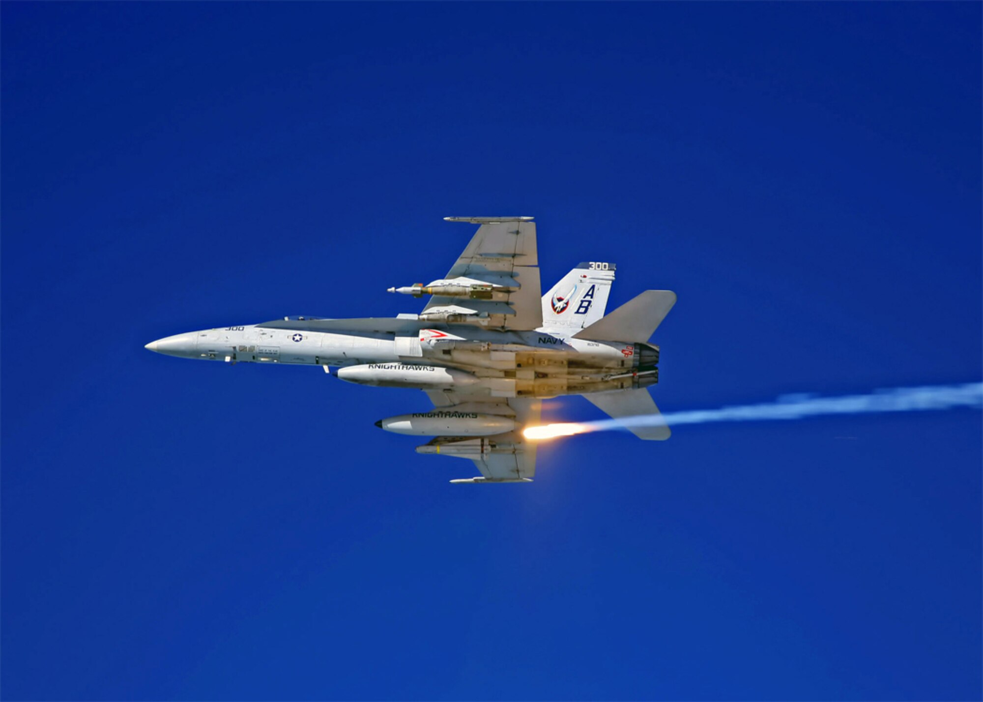 An F/A-18C, assigned to the "Knighthawks" of Strike Fighter Squadron (VFA) 136, uses flare countermeasures in support of Coalition ground forces in Iraq. VFA-136 is assigned to Carrier Air Wing 1 embarked aboard the nuclear powered aircraft carrier USS Enterprise. The Enterprise Carrier Strike Group is on a deployment in support of maritime operations and the global war on terrorism.  (U.S. Navy photo by Lt. Peter Scheu)