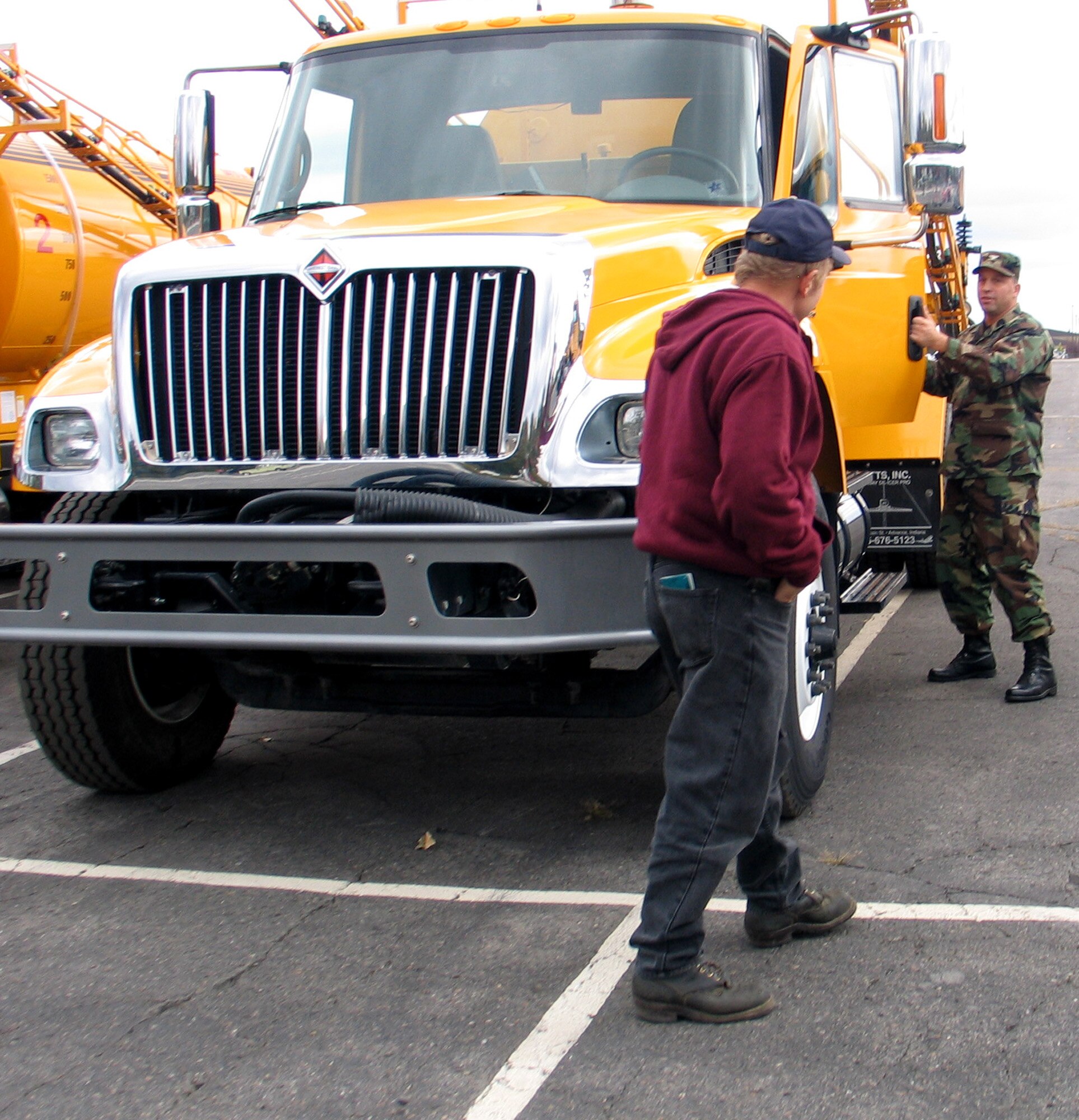 FAIRCHILD AIR FORCE BASE, Wash. – Col. Thomas Sharpy, 92nd Air Refueling Wing commander, checks out a snowplow vehicle from the 92nd Civil Engineer Sqaudron Snow Barn Oct. 5. Fairchild leadership, with help from plow operators, drove the plows around the base Oct. 5 during the annual Snow Parade, an event designed to give Fairchild a safety message: winter is coming.
(U.S. Air Force photo/Staff Sgt. Connie L. Bias)
