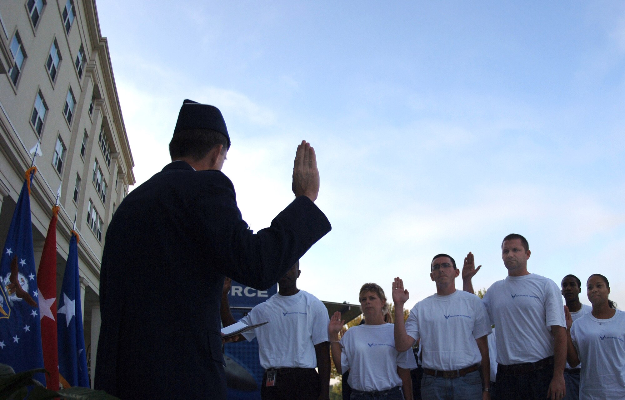 Maj. Gen. Scott Hammond administers the oath of enlistment to nine new recruits during a proclamation ceremony Oct. 8 in Marietta, Ga., which kicked off the Air Force Week Atlanta events. Atlanta is one of six cities throughout the country chosen to host an Air Force Week Oct. 8 to 14. General Hammond is the commander of the Georgia Air National Guard. (U.S. Air Force photo/Staff Sgt. Bennie J. Davis III) 