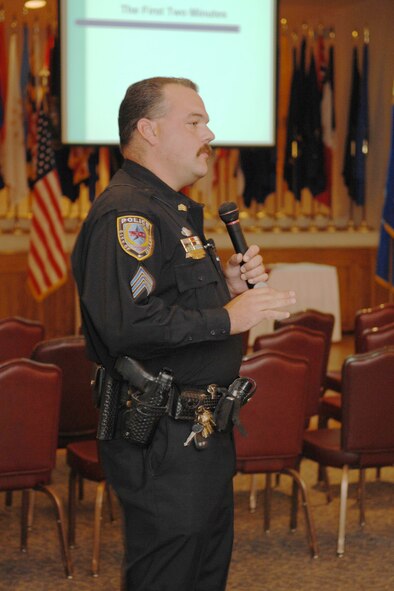 DYESS AIR FORCE BASE, Texas -- Sergeant Lynn Beard from the Abilene Police Department gives a domestic violence presentation to the men and women of Dyess  Oct. 5. October is Domestic Violence Awareness Month (U.S. Air Force photo by Airman 1st Class Jennifer Romig)