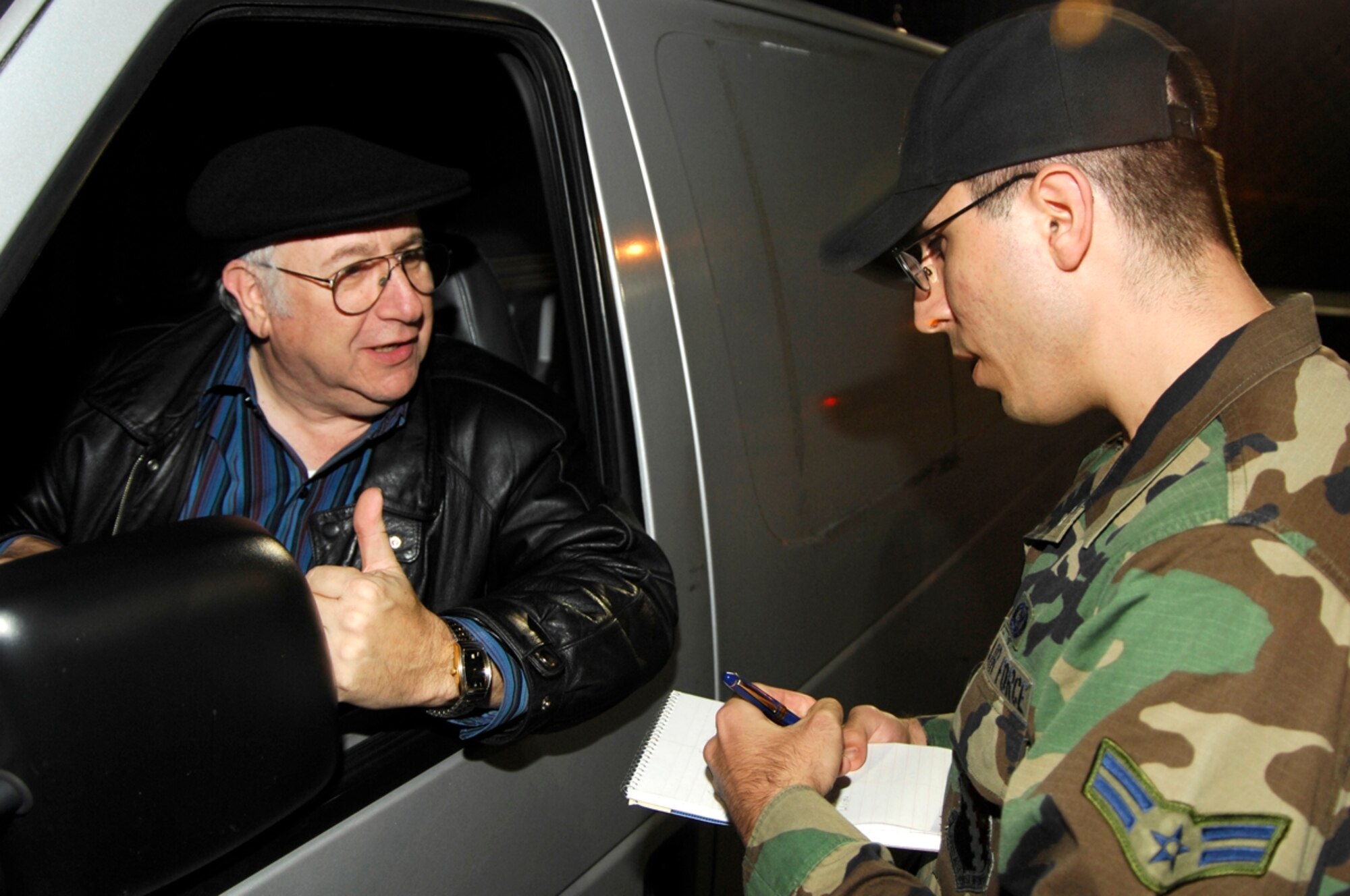 From left, David Ross, Electronic Systems Center Inspector General’s Office and a simulated reporter with WuHu News, questions then Airman 1st Class Clinton Atkins, 66th Air Base Wing Public Affairs, regarding an incident while trying to gain access to the base during a Base Readiness Exercise in 2006. Mr. Ross uses his acting skills on base by actively participating in base readiness scenarios. Recently, his skills landed him a speaking role and appearance in the Oct. 7 episode of Showtime’s “The Brotherhood.” 