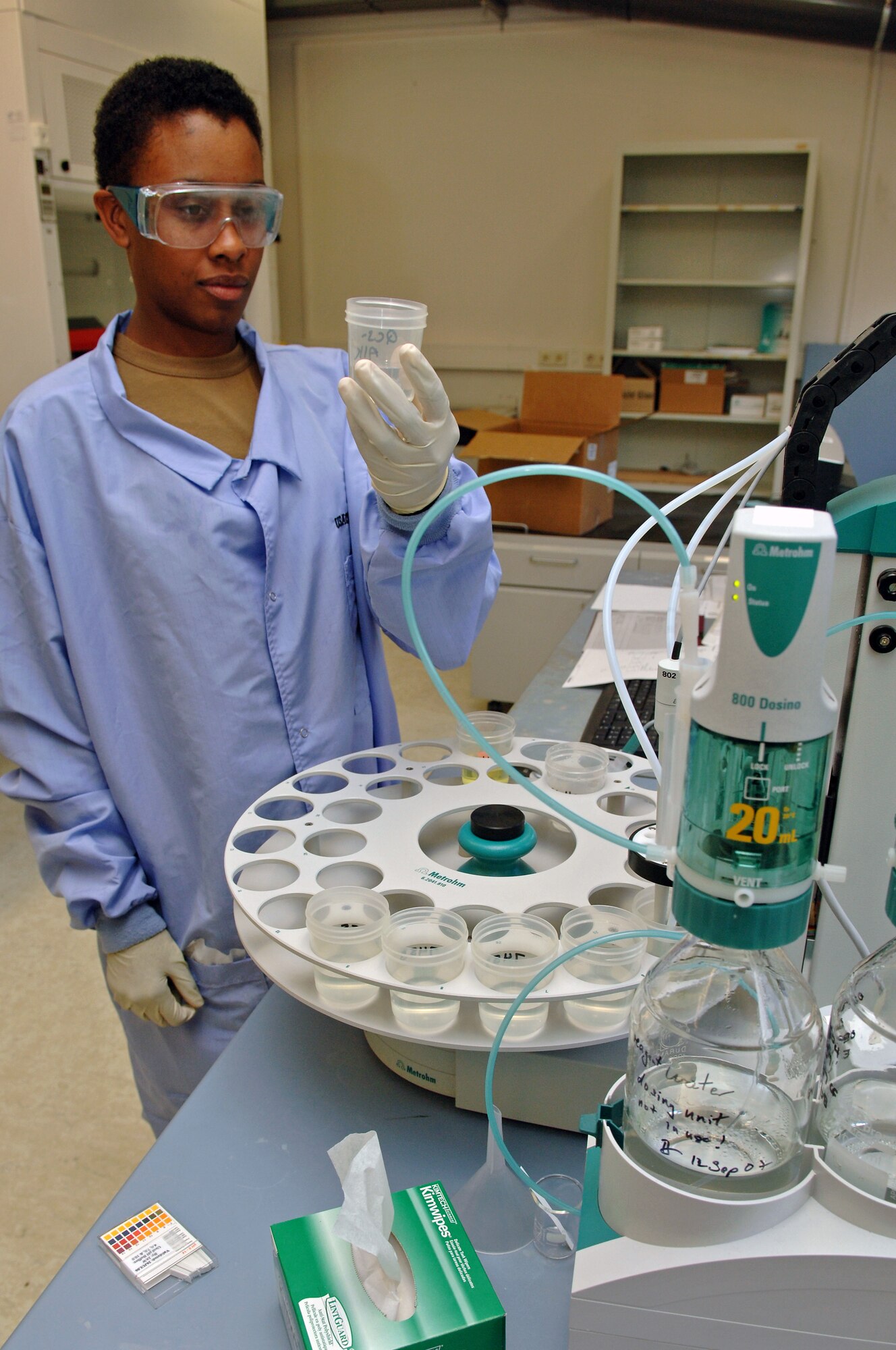 Sgt. Samantha Nosek, U.S. Army Center for Health Promotion and Preventive Medicine physical science technician, adds acid to water to determine the alkalinity of the sample at the Landstuhl Regional Medical Center, Germany, Oct. 10. The USACHPPM provides worldwide scientific expertise and services in clinical and field preventive medicine, environmental and occupational health, health promotion and wellness, epidemiology and disease surveillance, toxicology, and related laboratory sciences. (U.S. Air Force photo/Airman 1st Class Marc I. Lane)(RELEASED)