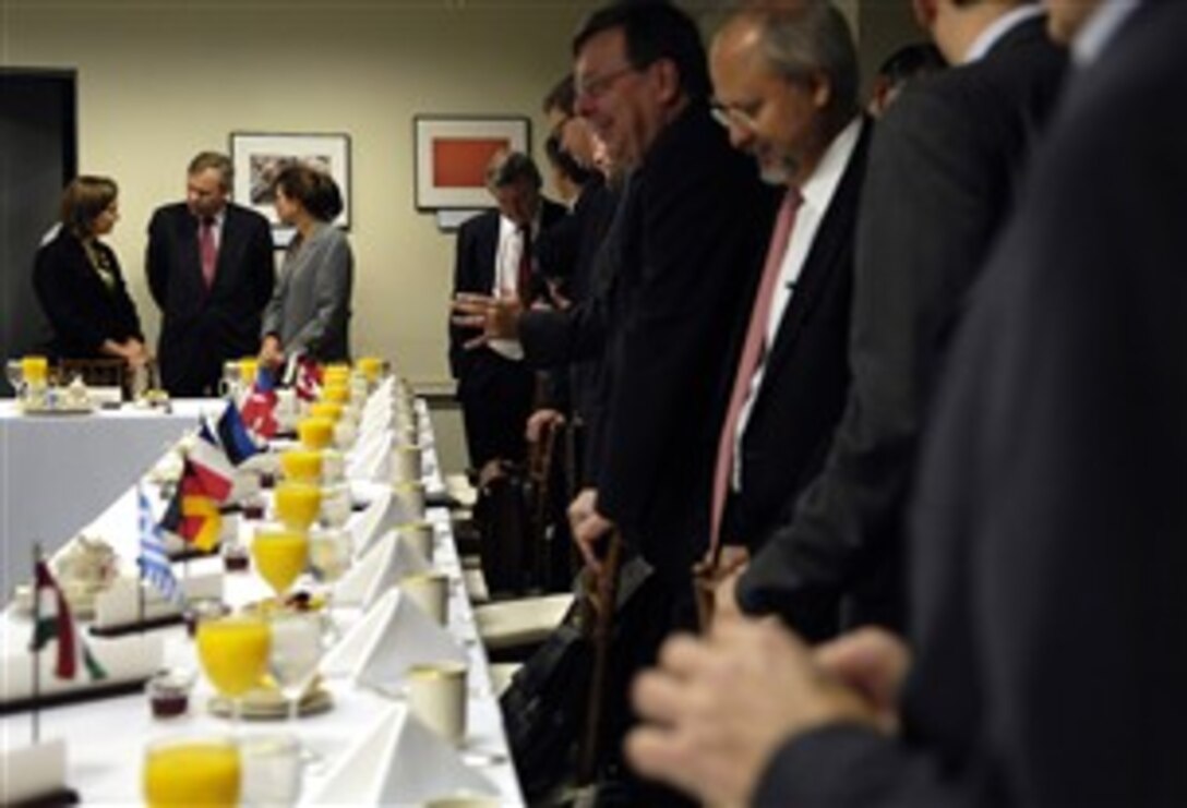 NATO Secretary General Jaap de Hoop Scheffer, second from left, speaks with U.S. Ambassador to NATO Victoria Nuland, left, and Mary Beth Long, acting assistant secretary of defense for International Security Affairs, during a breakfast meeting with Defense Secretary Robert M. Gates at the Pentagon, Oct. 10, 2007.  