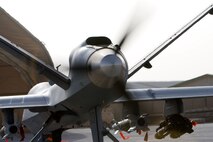 An MQ-9 Reaper goes through an engine check on a ramp in Afghanistan Oct. 1. (Courtesy photo)