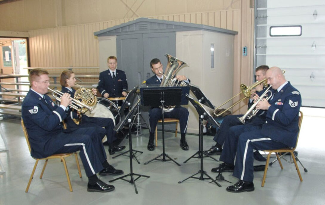 The Offutt Brass of the USAF Heartland of America Band provided pre-ceremony music for the dedication of Offutt AFB's new Airman Leadership School building.