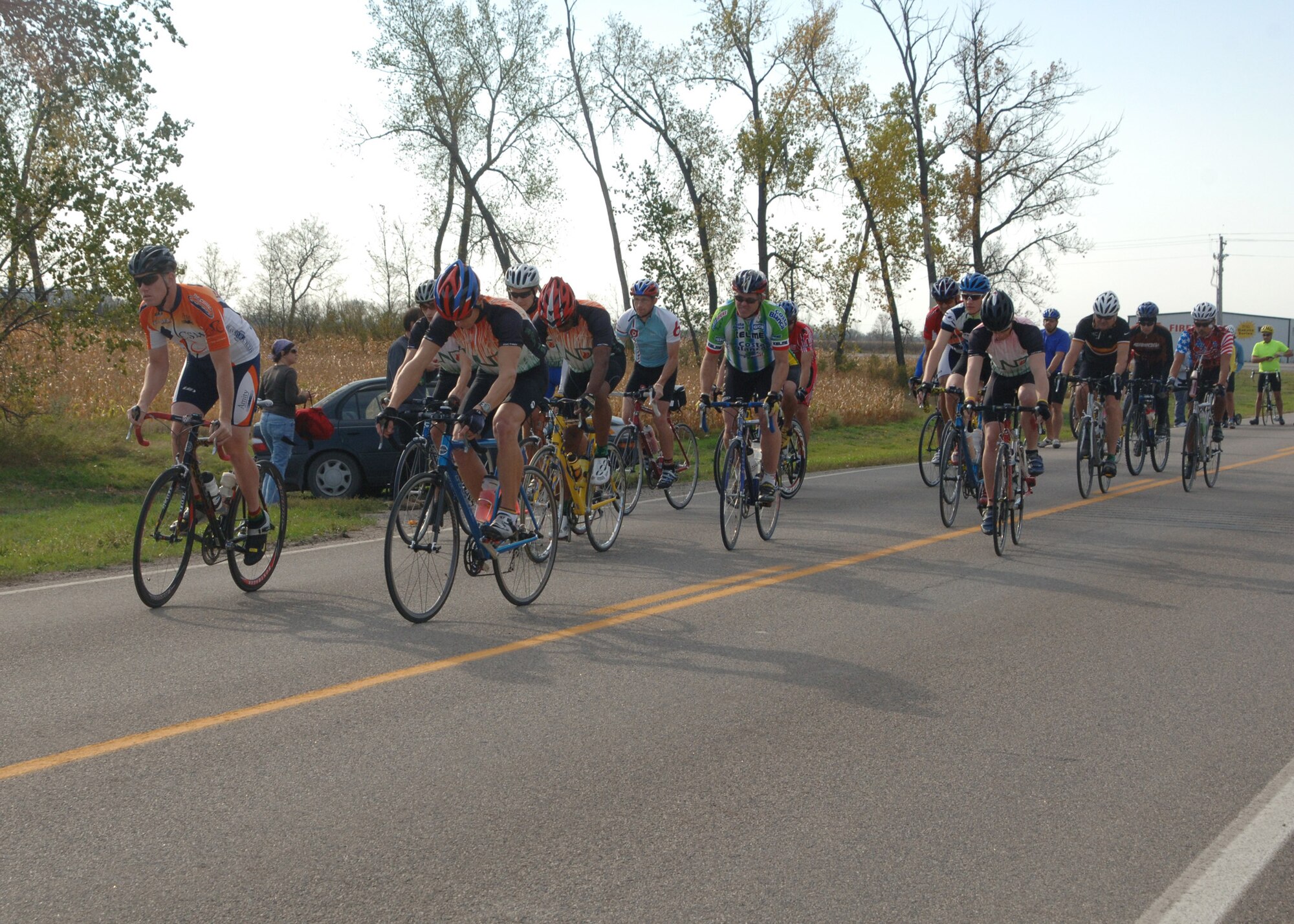 Men and women from Grand Forks Air Force Base and the Grand Forks area begin the Warriors of the North Bike Race on Sept. 29.  Approximately 45 racers participated in either the 16 or 32 mile courses.