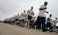 LANGLEY AIR FORCE BASE, Va. -- Airmen run in formation down the west flightline during the 1st Fighter Wing Safety Day, Oct. 5. The safety day was designed to educate Airmen on the importance of personal safety as well as the safety of others. The day’s events included the wingmen run, briefings from 1st FW commanders and group discussions. (U.S. Air Force photo/Airman 1st Class Chase Skylar DeMayo)