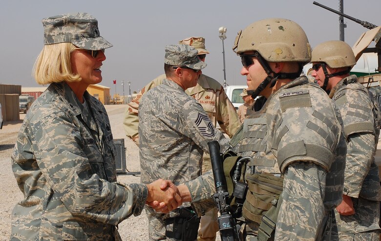 SOUTHWEST ASIA -- Brig. Gen. Mary Kay Hertog, Air Force security forces director, visits with deployed Airmen at Camp Bucca, Iraq, Oct. 10.  Brig. Gen. Hertog discussed deployment tempos, training and the future of the career field (U.S. Air Force photo/Staff Sgt. Tia Schroeder)