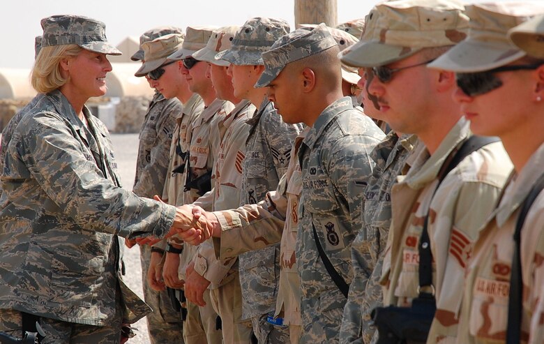 SOUTHWEST ASIA -- Brig. Gen. Mary Kay Hertog, Air Force security forces director, visits with deployed Airmen at Camp Bucca, Iraq, Oct. 10.  Brig. Gen. Hertog discussed deployment tempos, training and the future of the career field (U.S. Air Force photo/Staff Sgt. Tia Schroeder)