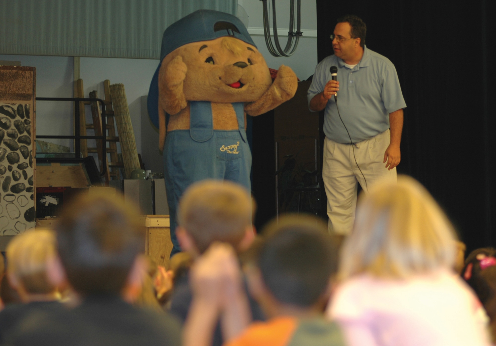 AVIANO AIR BASE, Italy--Sam Renick and Sammy the Rabbit talk to children about how to save money Oct. 9. Mr. Renick hopes the ?It?s a Habit? program will help curb financial literacy among children and families. The program is sponsored by the Air Force Aid society. (U.S. Air Force Photo/Senior Airman Justin Weaver).