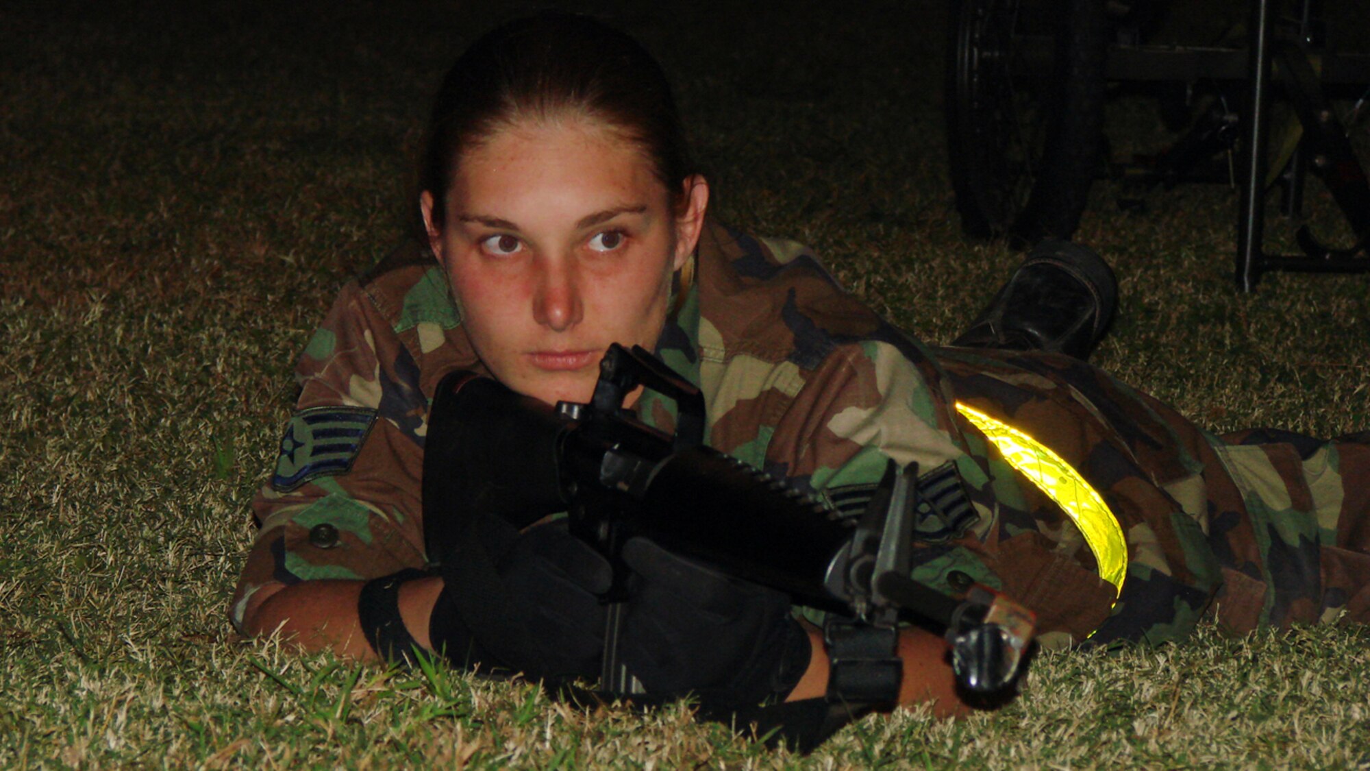 Staff Sgt. Charrissa Smith, 71st Medical Group Aerospace Physiology, guards the camp perimeter during a Medical Unit Readiness Training exercise Oct. 11. The annual training ensures medical personnel are prepared to perform their duties in a deployed environment. (U.S. Air Force photo by Tech. Sgt. Mary Davis)