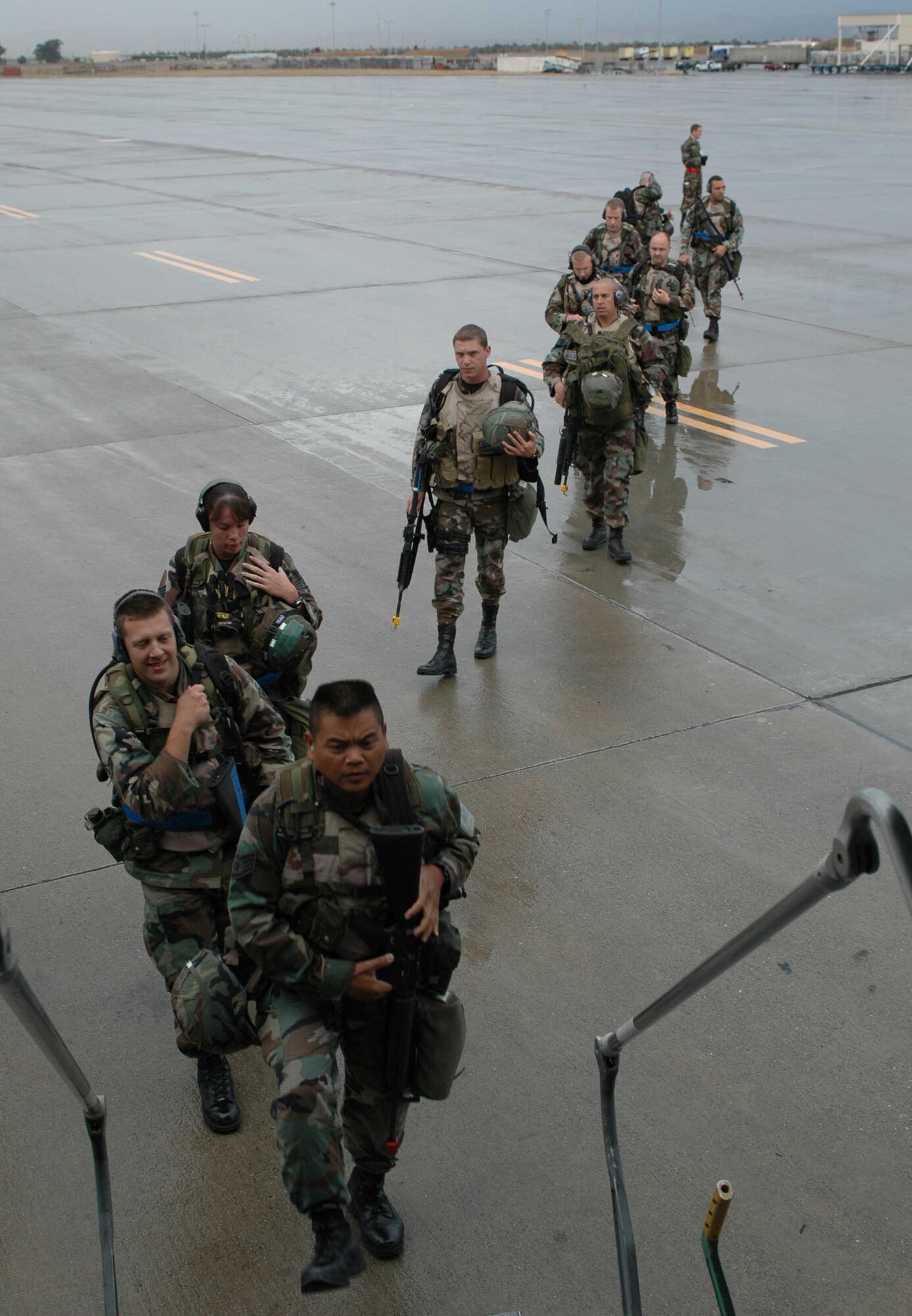 Members of the 615th Contingency Response Wing board a C-17 Globemaster III Oct. 12, enroute to Gulfport, Miss., for their first-ever Operational Readiness Inspection. The inspection will test their ability to open up and sustain an operational airbase. (U.S. Air Force photo/Staff Sgt. Candy Knight)