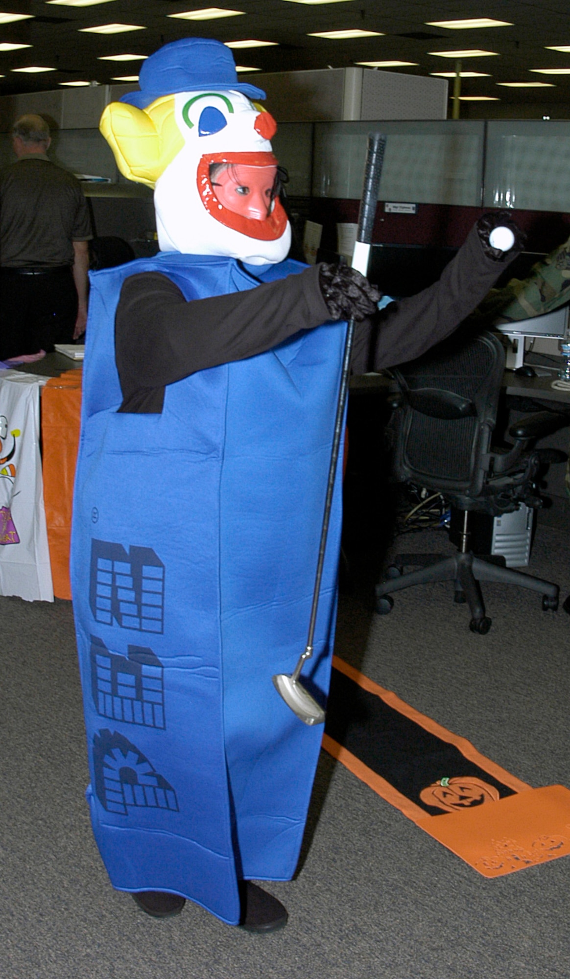 Cindy Slovik, DPS, is dressed as a candy dispenser during the second annual Combined Federal Campaign Halloween Putt Putt Golf Tournament at ARPC. The event was held to raise money for the CFC.