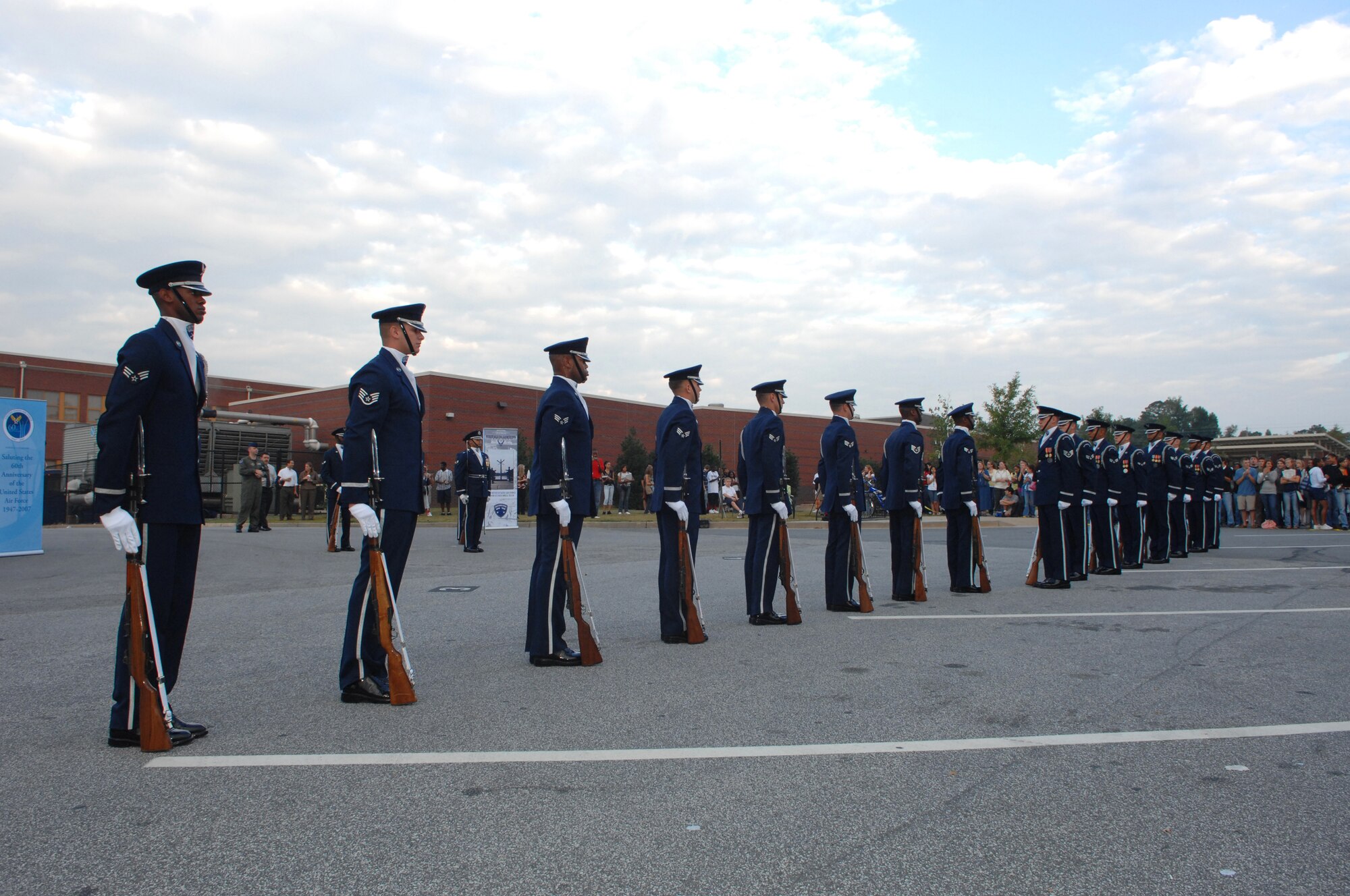 Members of the Air Force Honor Guard Drill Team perform at Marietta High School in Marietta, Ga. on October 9, 2007. The drill team visited several area high schools, with other Air Force demo teams, as part of Air Force Week Atlanta events leading up to the Great Georgia Air Show in Peachtree City, Ga., and promoted the AF mission by showcasing drill performances at public and military venues to recruit, retain, and inspire Airmen. ( U.S. Air Force photo/Airman First Class Tim Chacon)(Released)