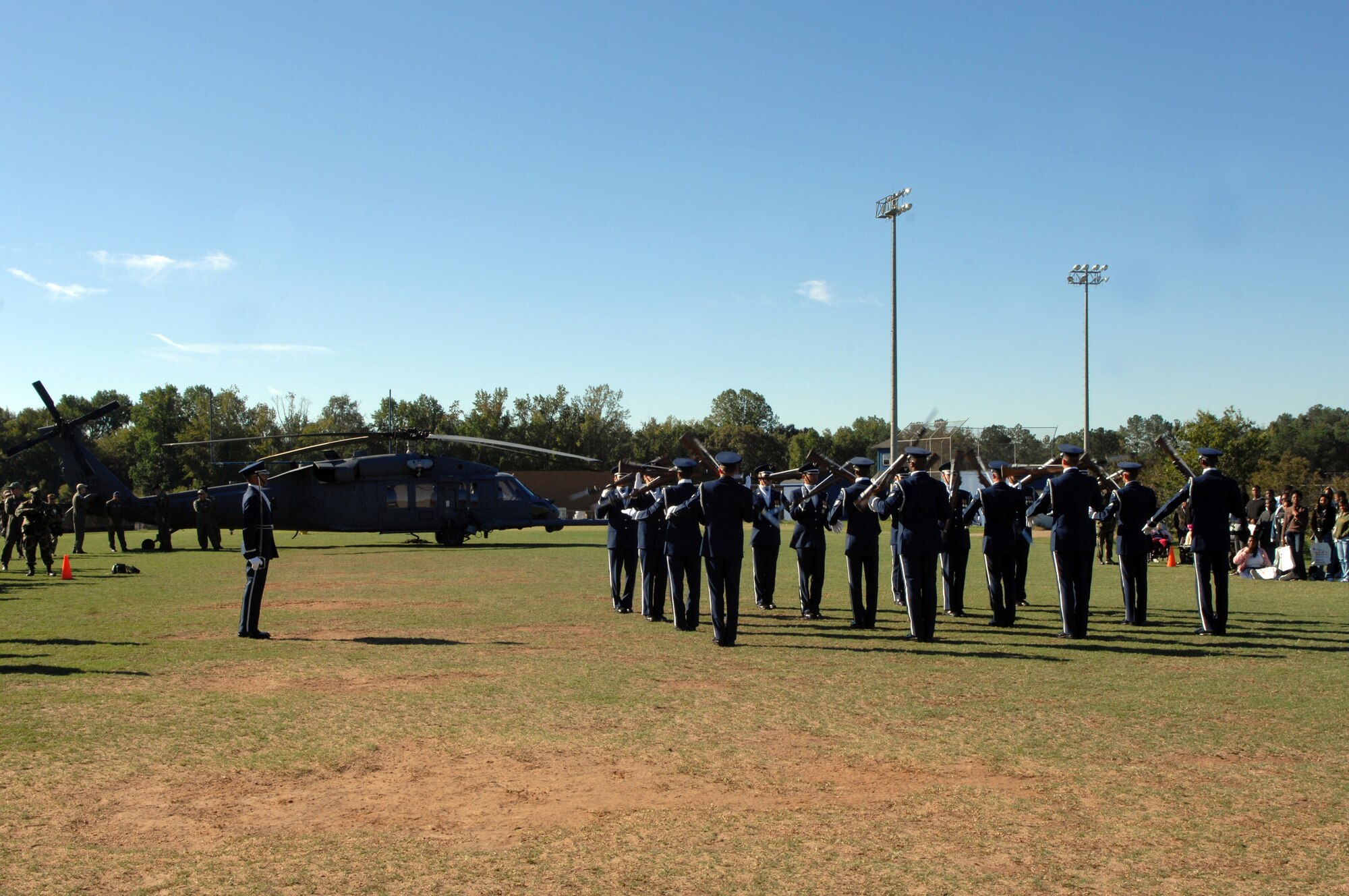 Members of the Air Force Honor Guard Drill Team perform at Lovejoy High School in Lovejoy, Ga. on October 11, 2007.  The drill team visited several area high schools, with other Air Force demo teams, as part of Air Force Week Atlanta events leading up to the Great Georgia Air Show in Peachtree City, Ga., and promoted the AF mission by showcasing drill performances at public and military venues to recruit, retain, and inspire Airmen. ( U.S. Air Force photo/Airman First Class Tim Chacon)(Released)