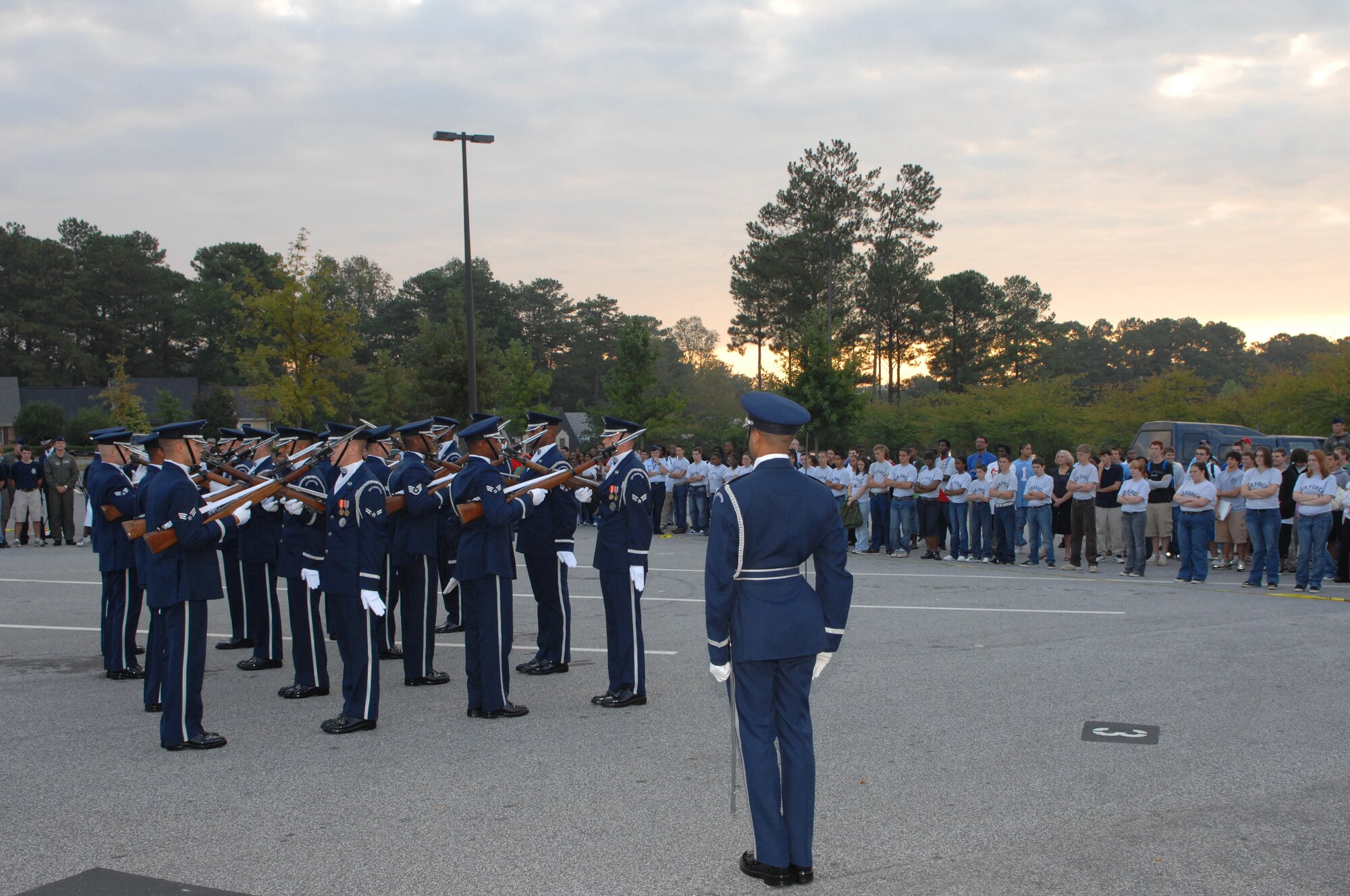Members of the Air Force Honor Guard Drill Team perform at Marietta High School in Marietta, Ga. on October 9, 2007.  The drill team performed at several area high schools with other Air Force demo teams as part of Air Force Week Atlanta events leading up to the Great Georgia Air Show in Peachtree City, Ga., and promoted the AF mission by showcasing drill performances at public and military venues to recruit, retain, and inspire Airmen. ( U.S. Air Force photo/Airman First Class Tim Chacon)(Released)