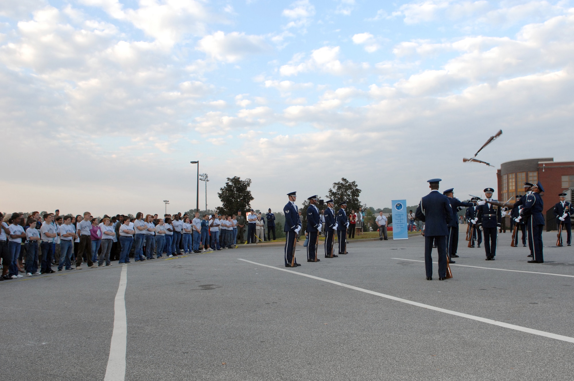 Members of the Air Force Honor Guard Drill Team perform a routine at Marietta High School in Marietta, Ga. on October 9, 2007.  The drill team performed at several area high schools, with other Air Force demo teams, as part of Air Force Week Atlanta events leading up to the Great Georgia Air Show in Peachtree City, Ga., and promoted the AF mission by showcasing drill performances at public and military venues to recruit, retain, and inspire Airmen. ( U.S. Air Force photo/Airman First Class Tim Chacon)(Released)