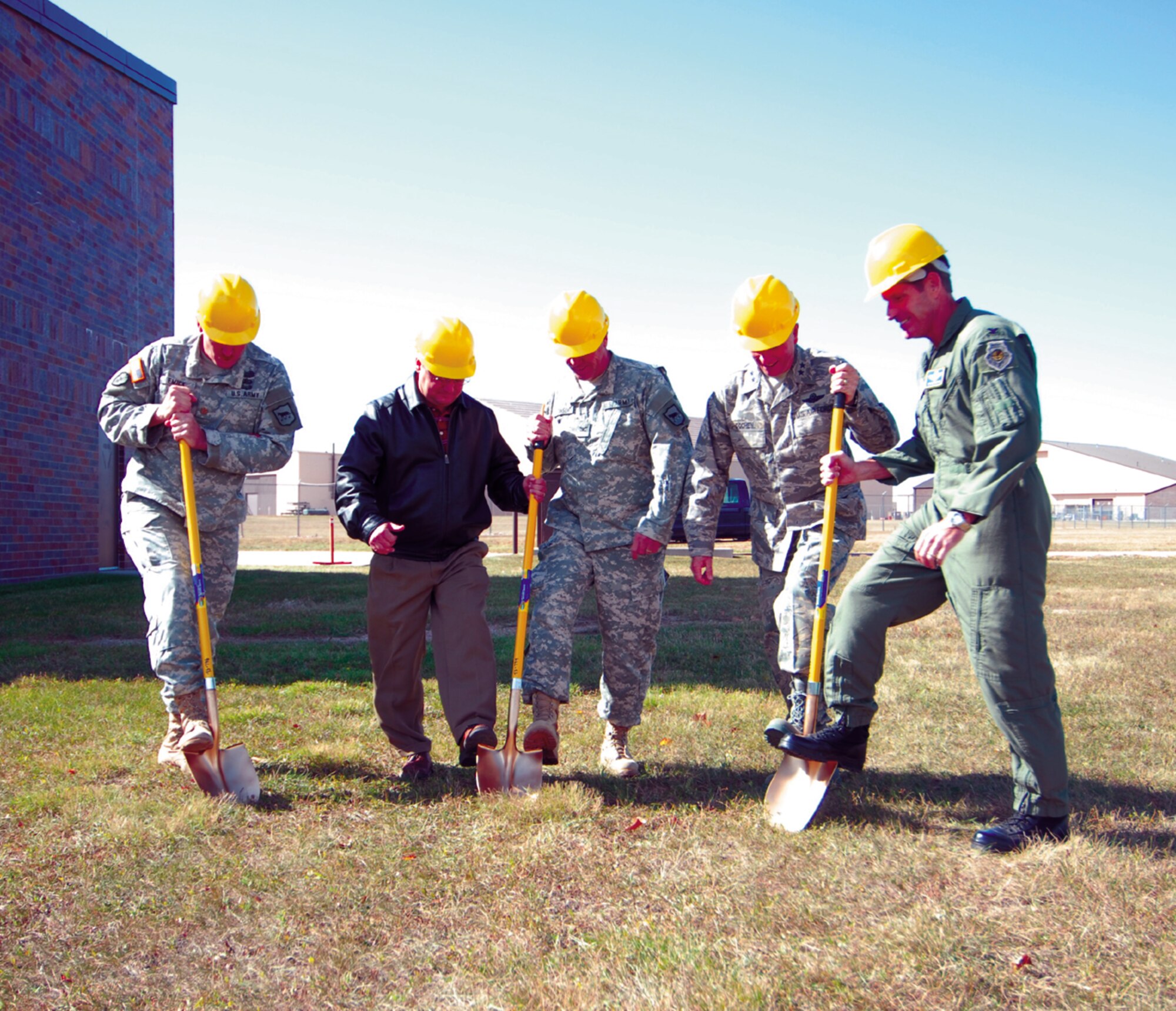 Ground was broken Oct. 11 on the South Dakota National Guard’s new facility at Ellsworth AFB. In attendance were Maj. Gen. Steven Doohen, SD National Guard Adjutant General (right), and Col. Peter Castor, 28th Bomb Wing vice commander. The new facility will house the 82nd Weapons of Mass Destruction Civil Support Team facility, which is consist of a 22-person team that can assist civil authorities in response to terrorist threat. (Photo by Capt Martha Petersante-Gioia)