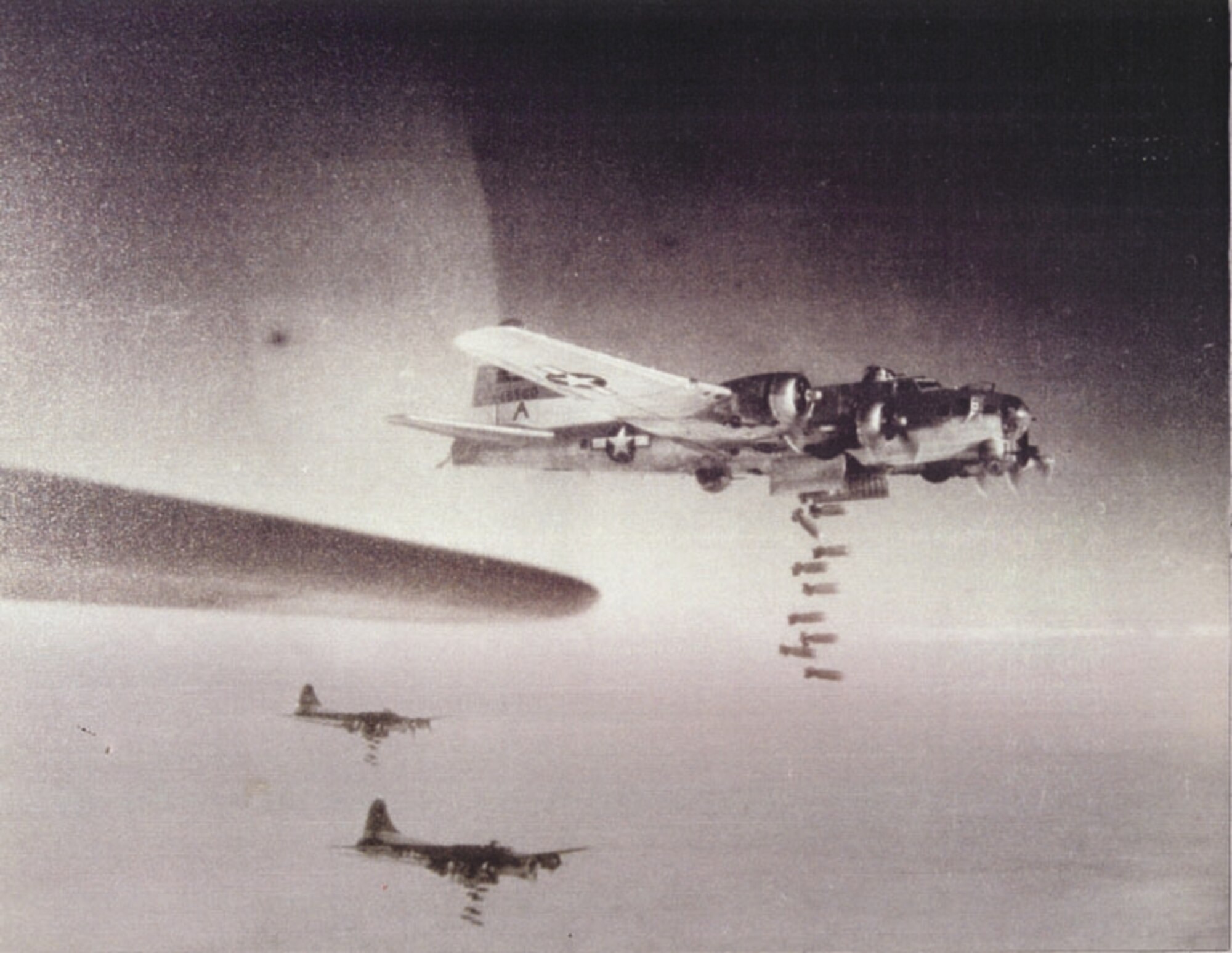 B-17s drop bombs over occupied Europe. (U.S. Army Air Corps photo by Harvey Shaw)
