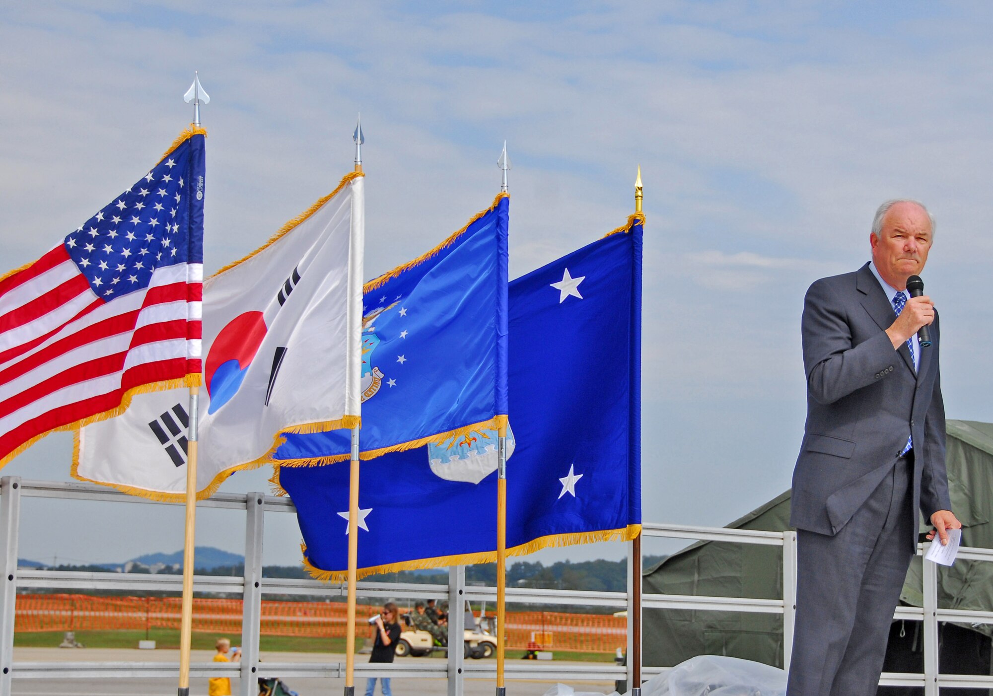 Secretary of the Air Force Michael W. Wynne addresses the crowd Oct. 6 during the opening ceremonies at Osan Air Base, South Korea, for Air Power Day, an annual air power demonstration. (U.S. Air Force photo/Staff Sgt. Ronnie Hill) 

