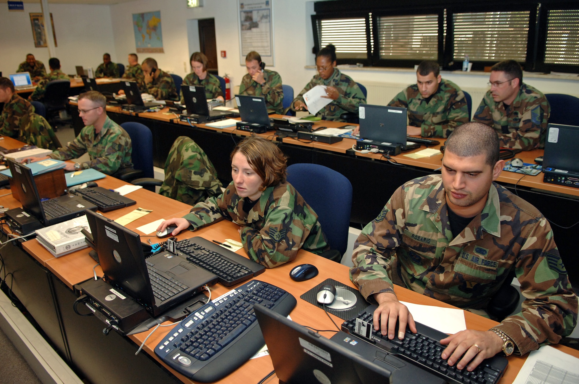 The Deployment Control Center coordinates unit level personnel and cargo movements for the Operational Readiness Exercise at the Joint Mobility Processing Center on Ramstein Air Base, Germany, Oct. 11. The exercise is designed to test the ability of Airmen to survive in austere environments with chemical, biological, radiological, nuclear, and explosive hazards. (U.S. Air Force photo/Airman 1st Class Marc I. Lane)(RELEASED)