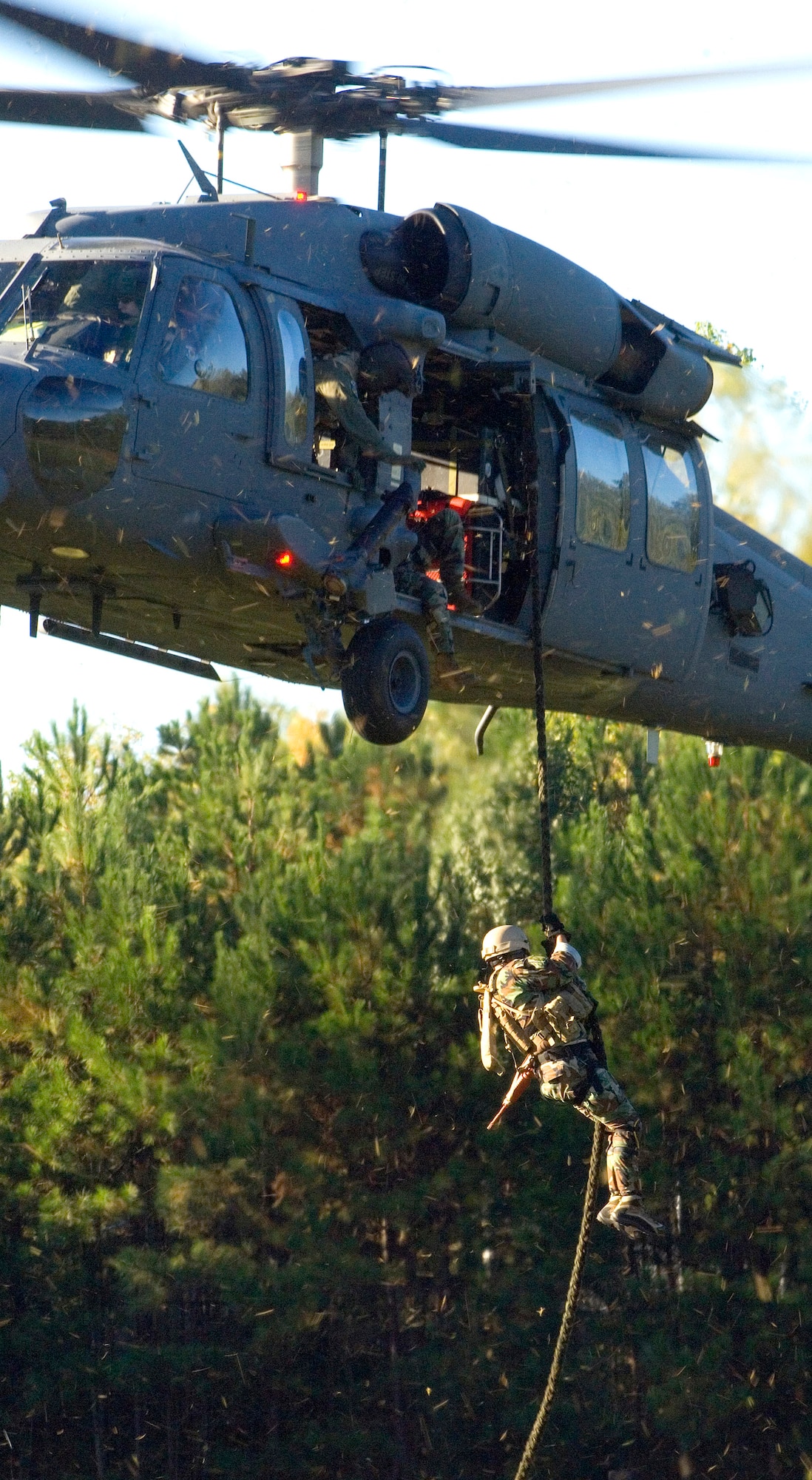 Members of the 920th Rescue Wing, at Patrick Air Force Base, Fla., hoist Master Sgt. John Shiman aboard their HH-60G Pave Hawk helicopter Oct. 10 during an Air Force Week Atlanta event at Etowah High School in Woodstock, Ga. (U.S. Air Force photo/Staff Sgt. Bennie J. Davis III) 
