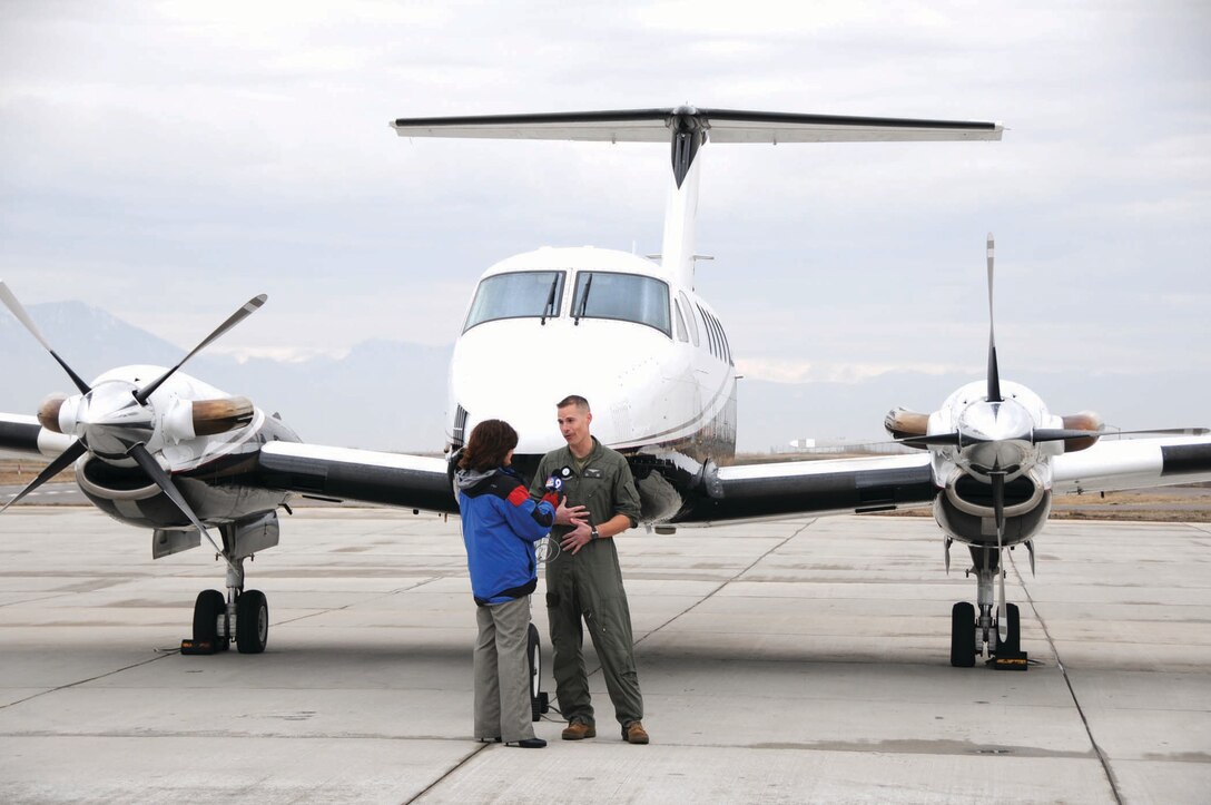 Brooke Thacker interviews Capt. Richard Birt for Channel 9 News’ morning program March 8.  Birt was at the Rocky Mountain Regional Airport for the Marine Corps Flight Orientation Program being held for the Denver Officer Selection Office.