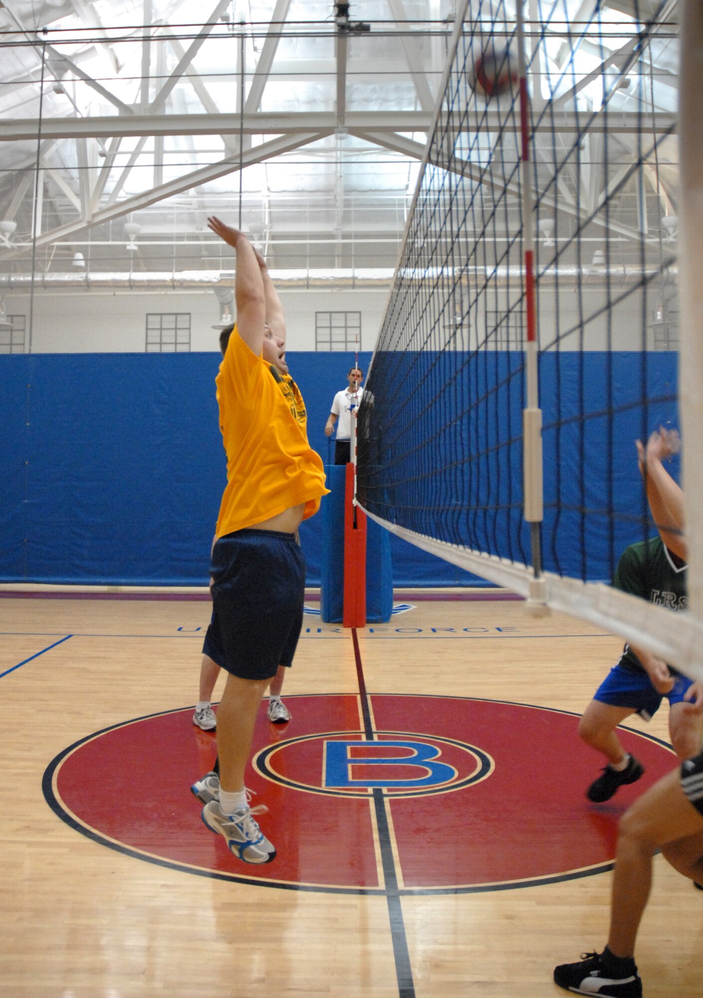 Staff Sgt. Timothy Gordon, 36th Communications Squadron, goes up for a block during an intramural volleyball game, Oct. 10.  The 36th CS won their game against the 36th Logistics Squadron. (U.S. Air Force photo/Senior Airman Miranda Moorer)
