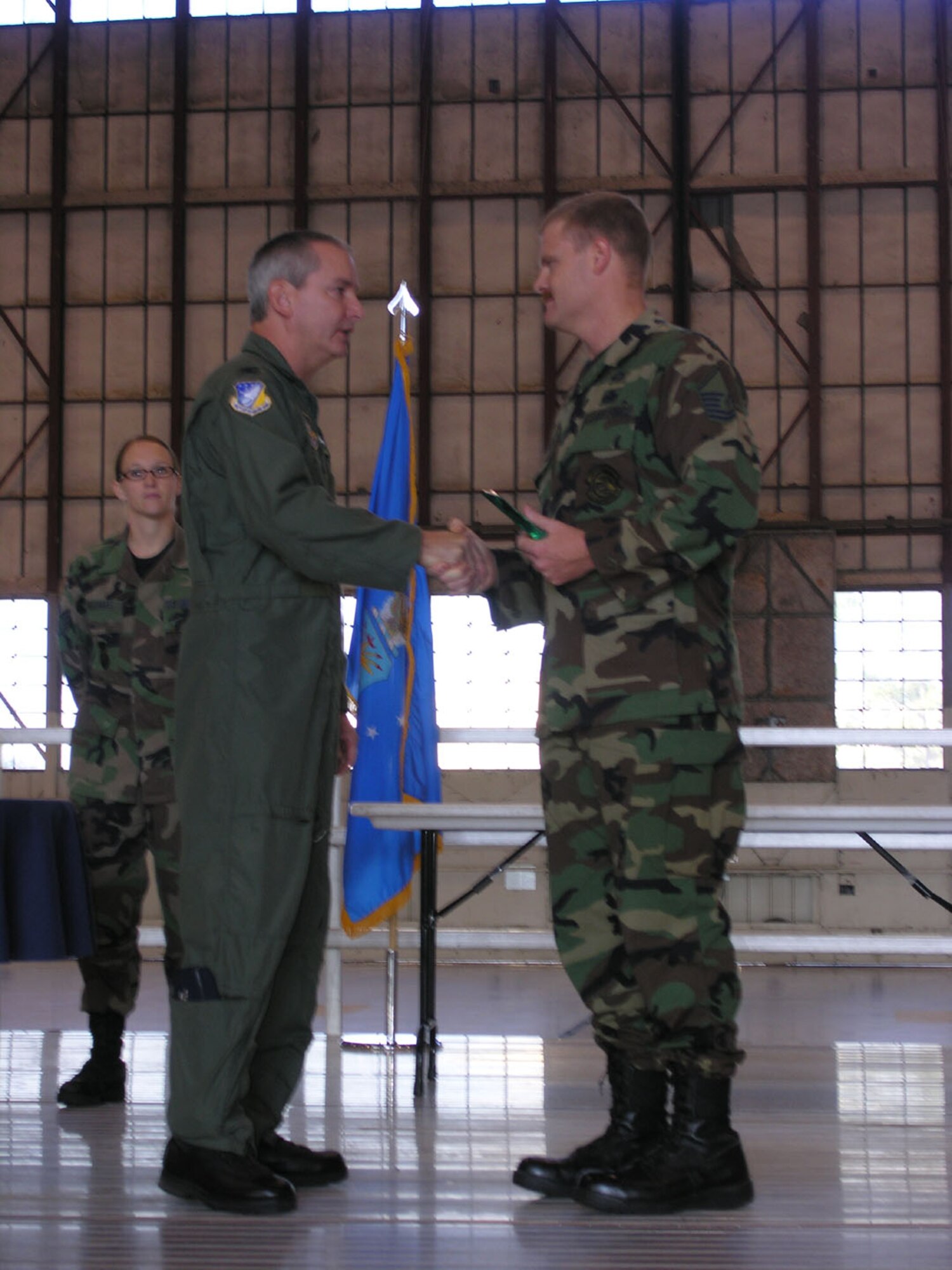 SEYMOUR JOHNSON AIR FORCE BASE, N.C.--Master Sgt. (ret) Harold Blount receives the third quarter award for Senior NCO of the  Quarter for the 916th Air Refueling Wing, Air Force Reserve. The award was presented during a wing commander's call formation during the October unit training assembly and presented by Col. Fritz Linsenmeyer, wing commander.