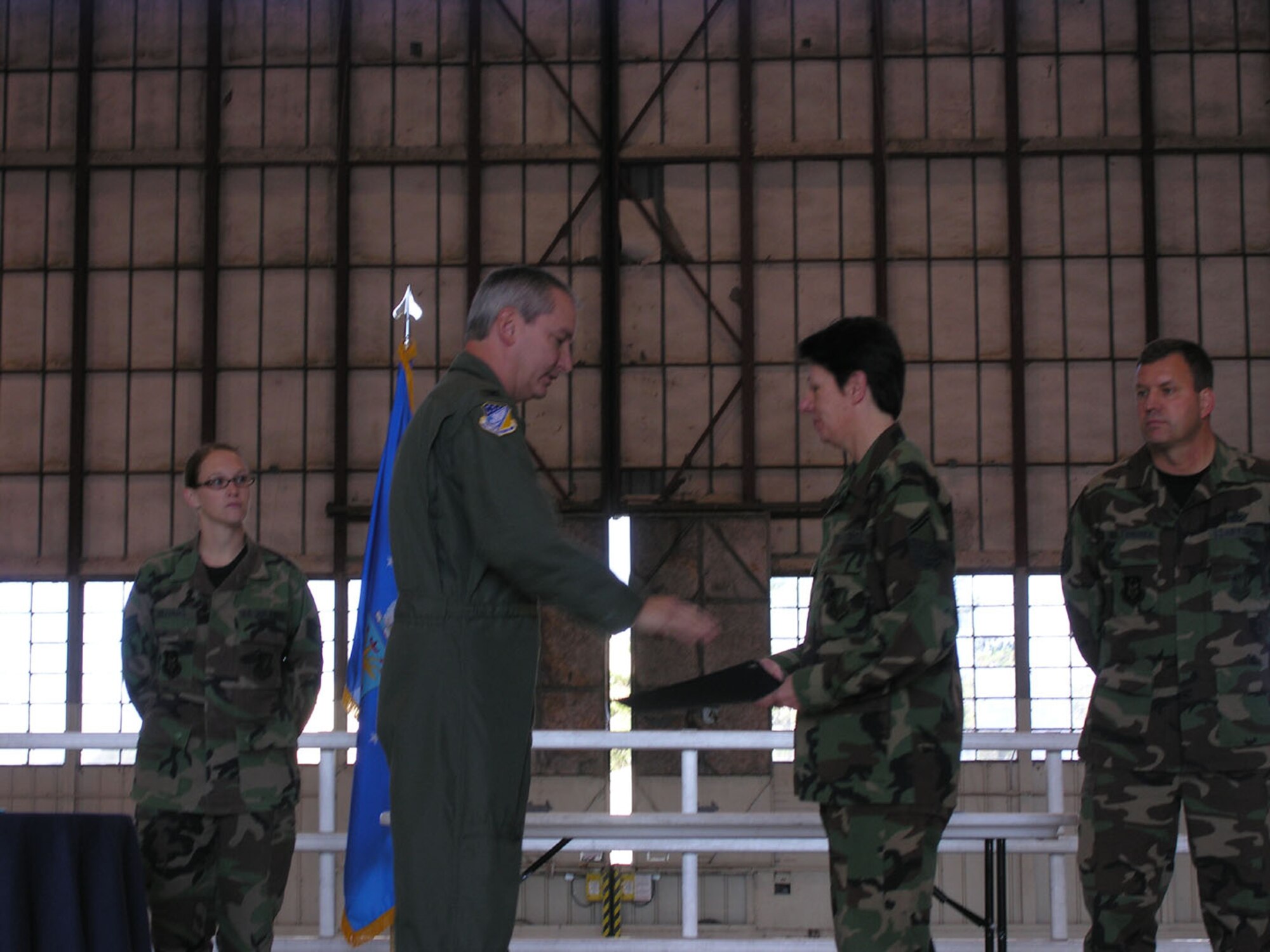 SEYMOUR JOHNSON AIR FORCE BASE, N.C.--Senior Master Sgt. Schonnie Moore receives an Air Force Reserve Command award on behalf of the 916th Training Section. The award was presented during a wing commander's call formation during the October unit training assembly and presented by Col. Fritz Linsenmeyer, wing commander.
